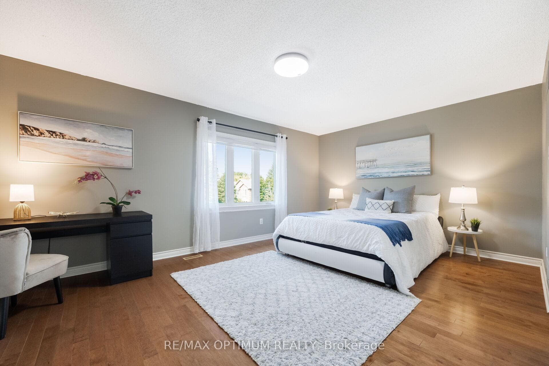 Generous bedroom with large window