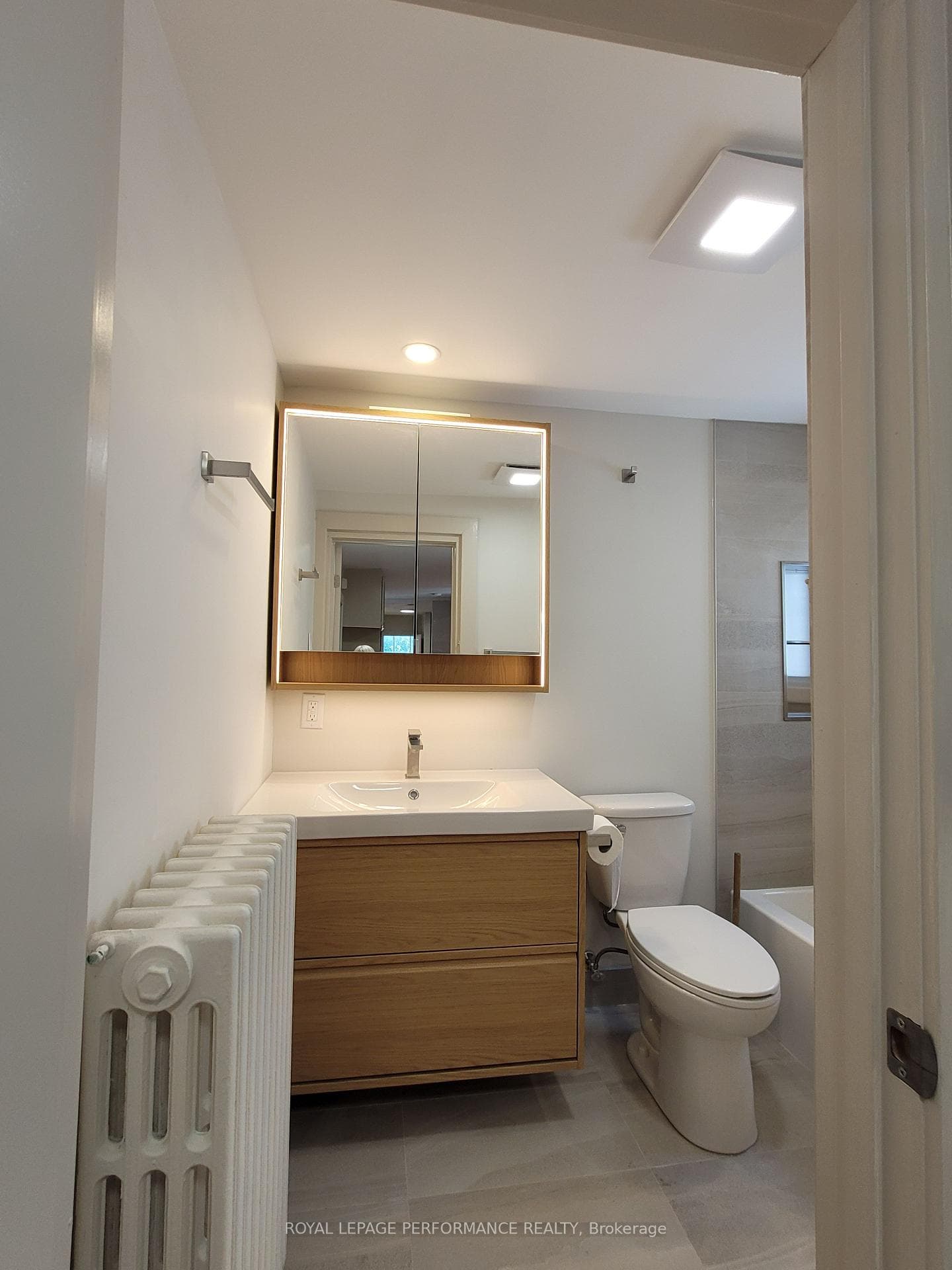 View from the entrance to the renovated bathroom