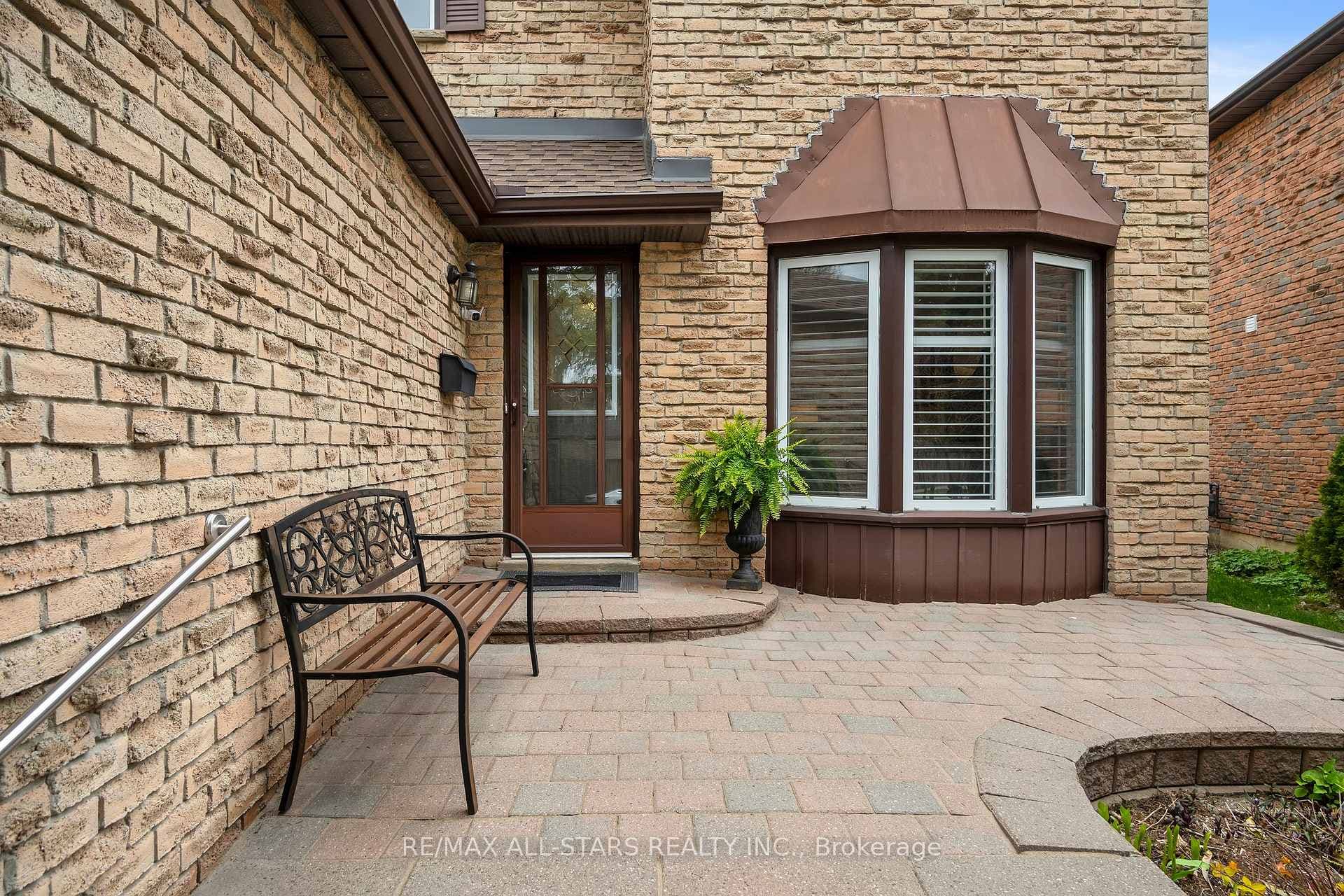Professionally landscaped front patio area