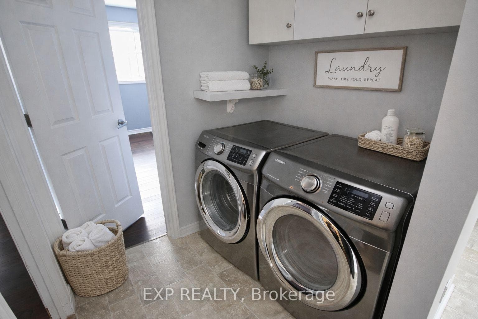 virtually declutterd and staged main floor laundry