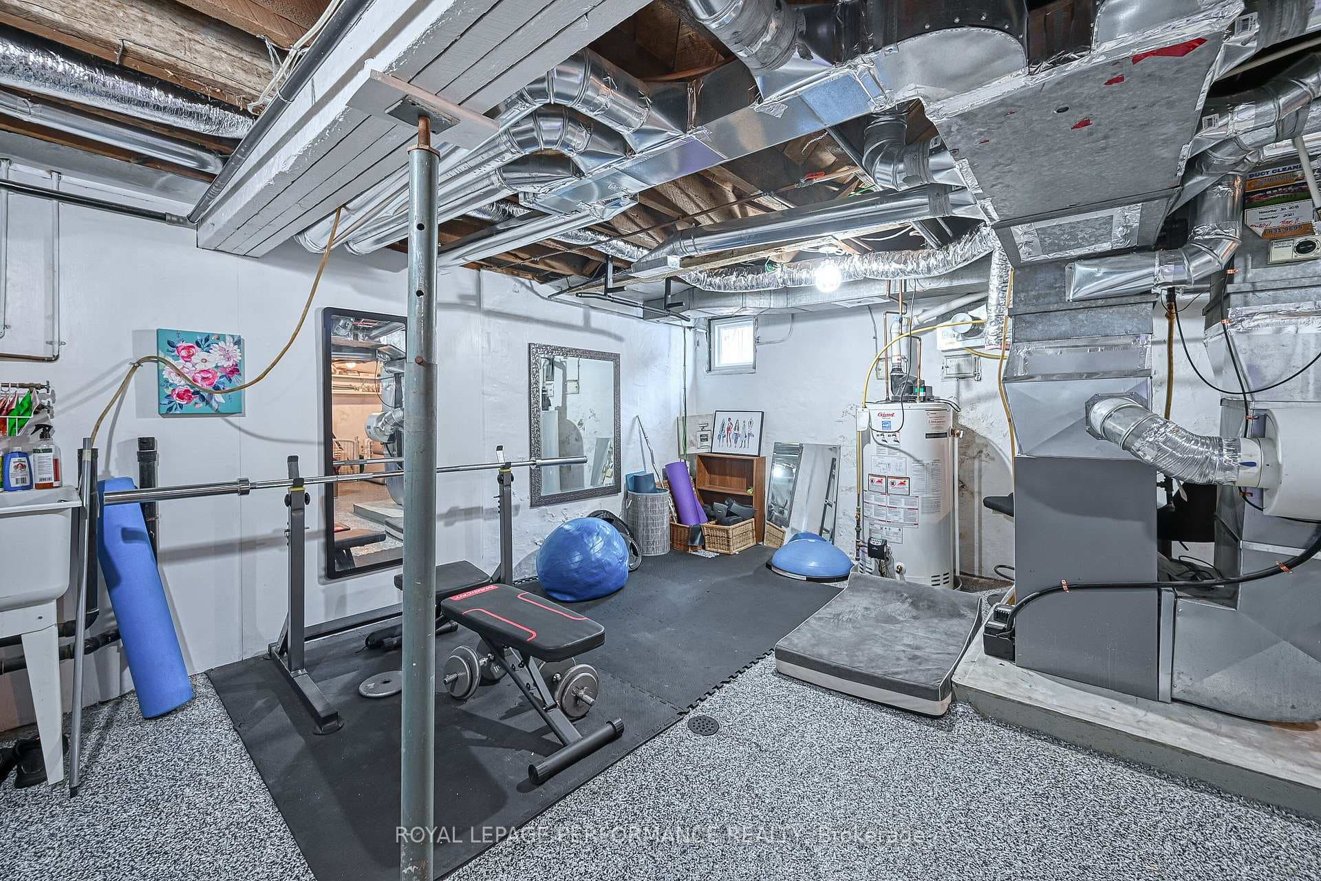 Basement with space for a home gym or storage