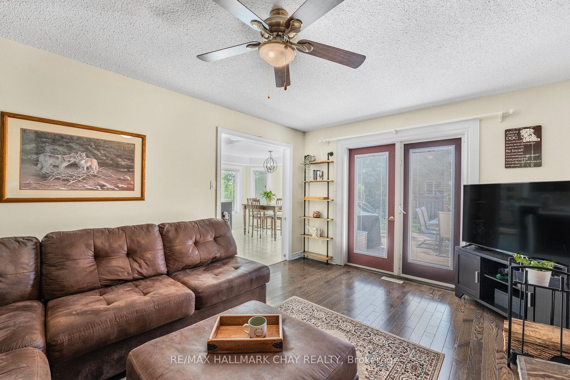Garden doors open to landscaped back yard
