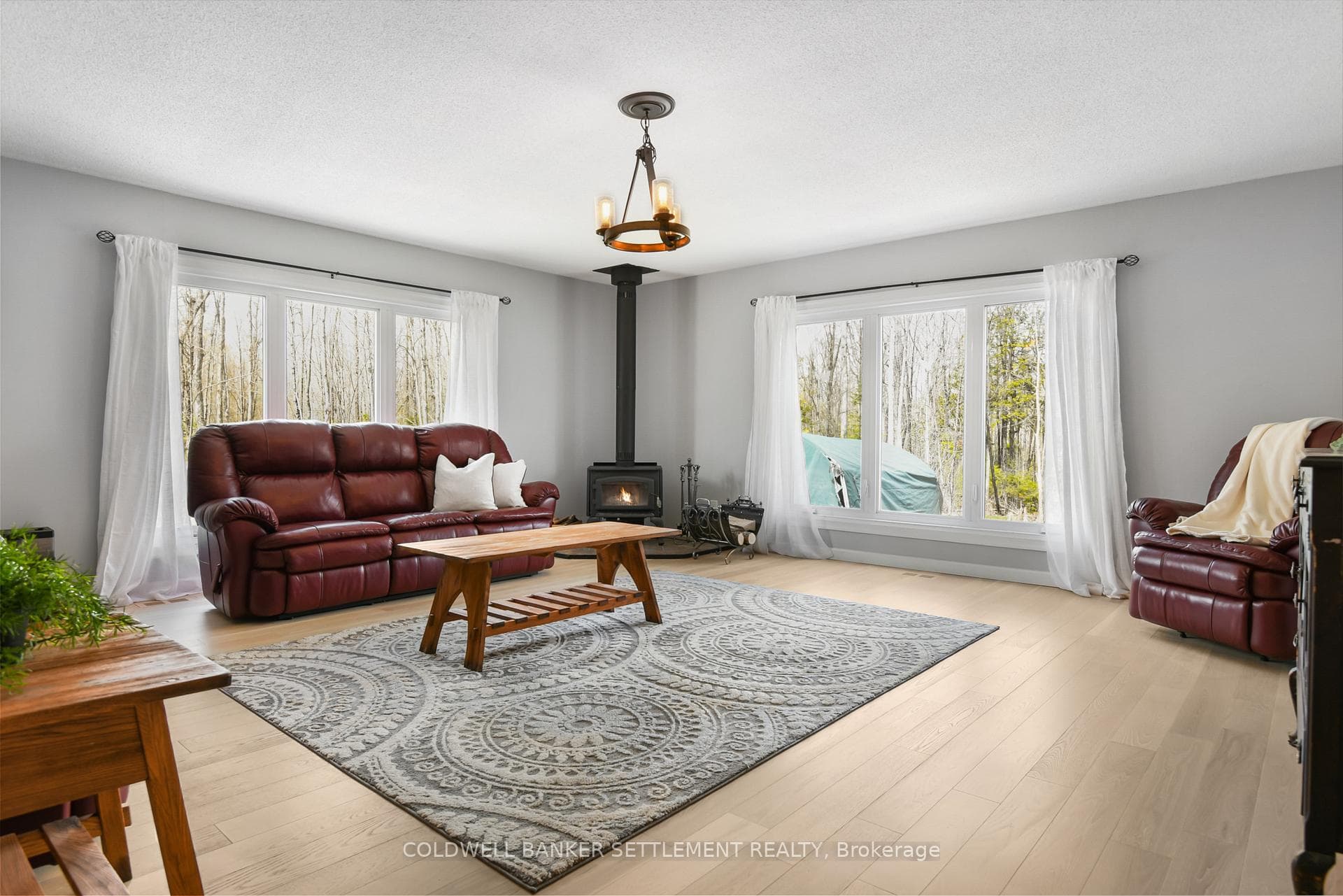 Formal living room with wood burning stove