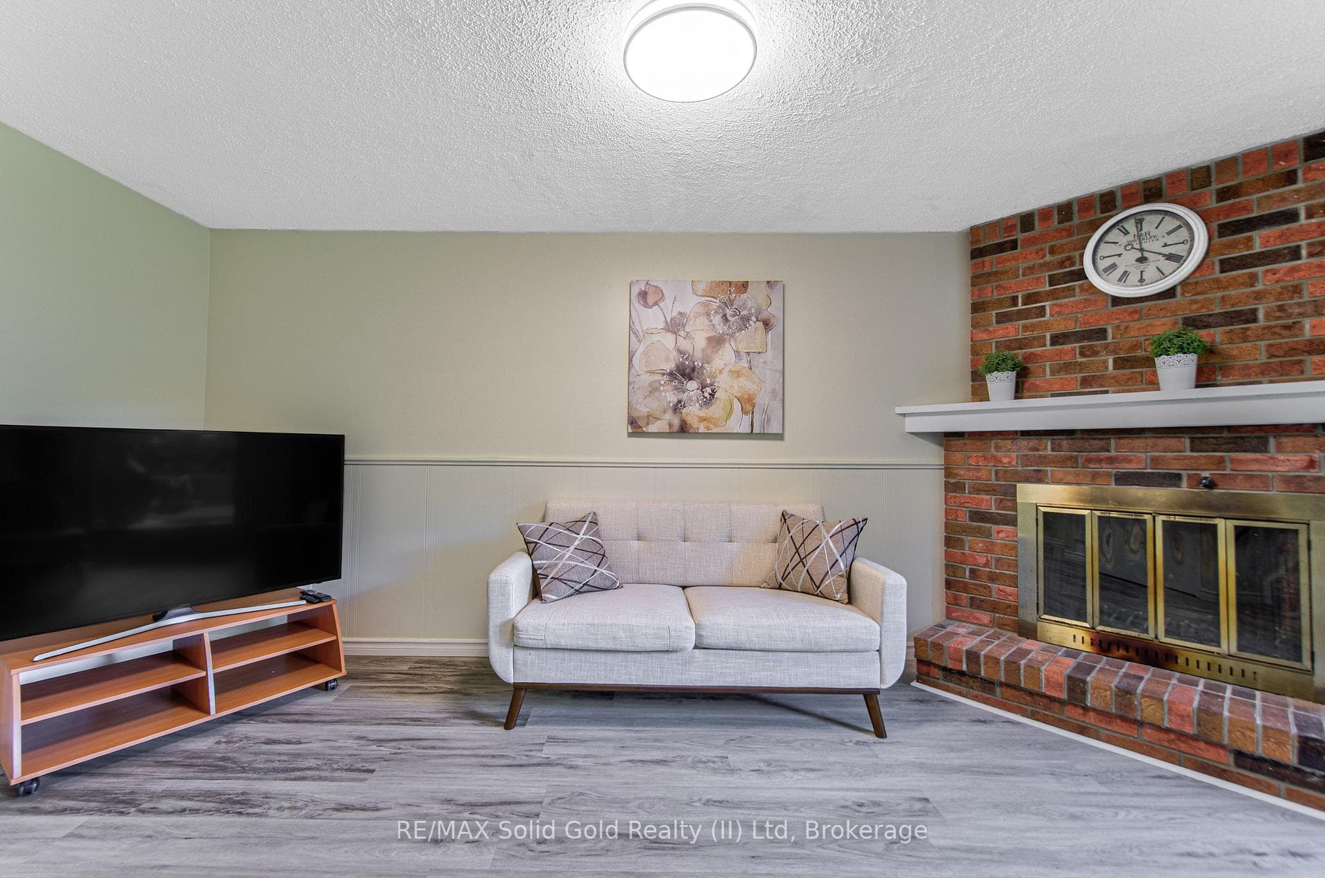 Wood fireplace in family room.