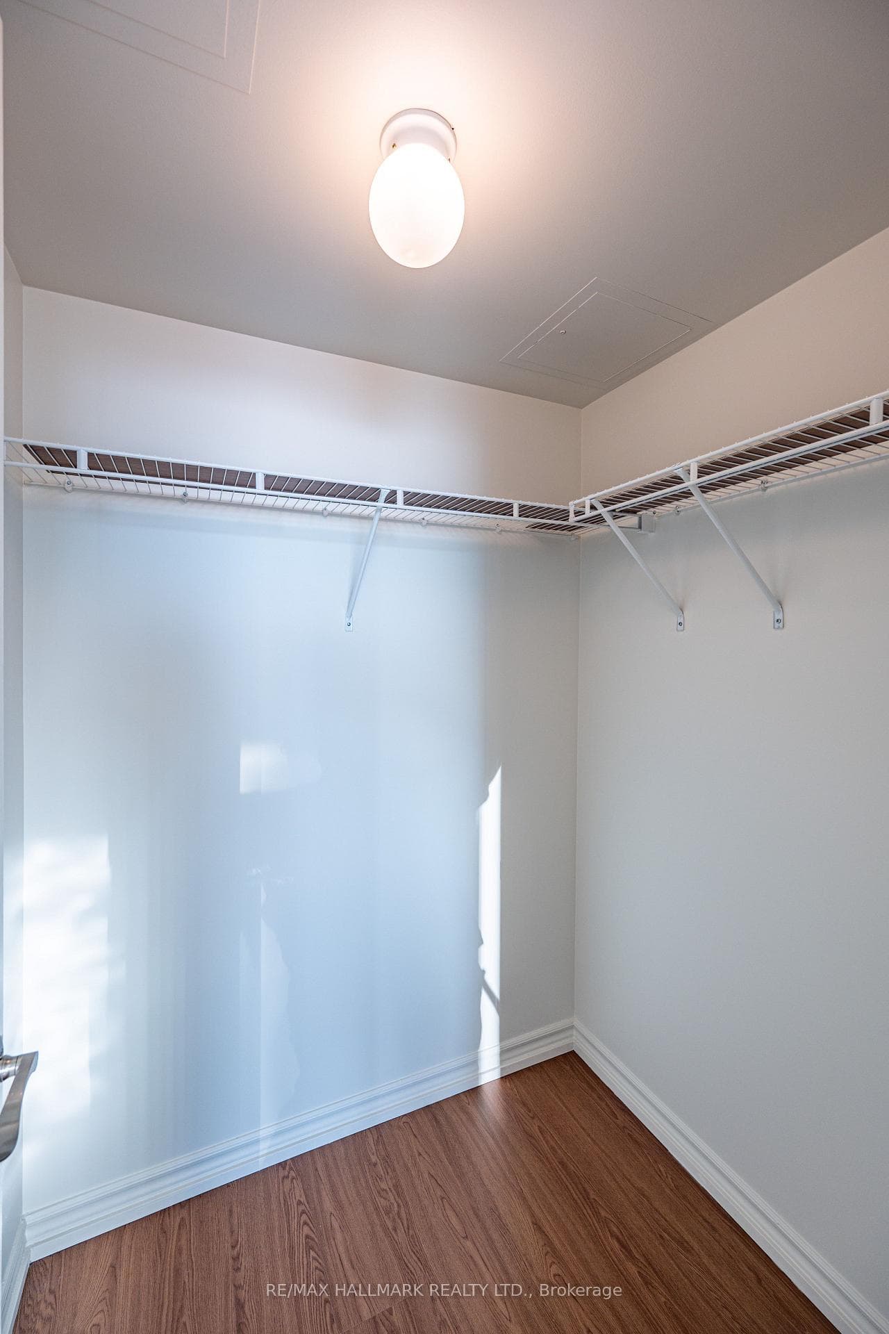 WALK-IN CLOSET - MASTER BEDROOM