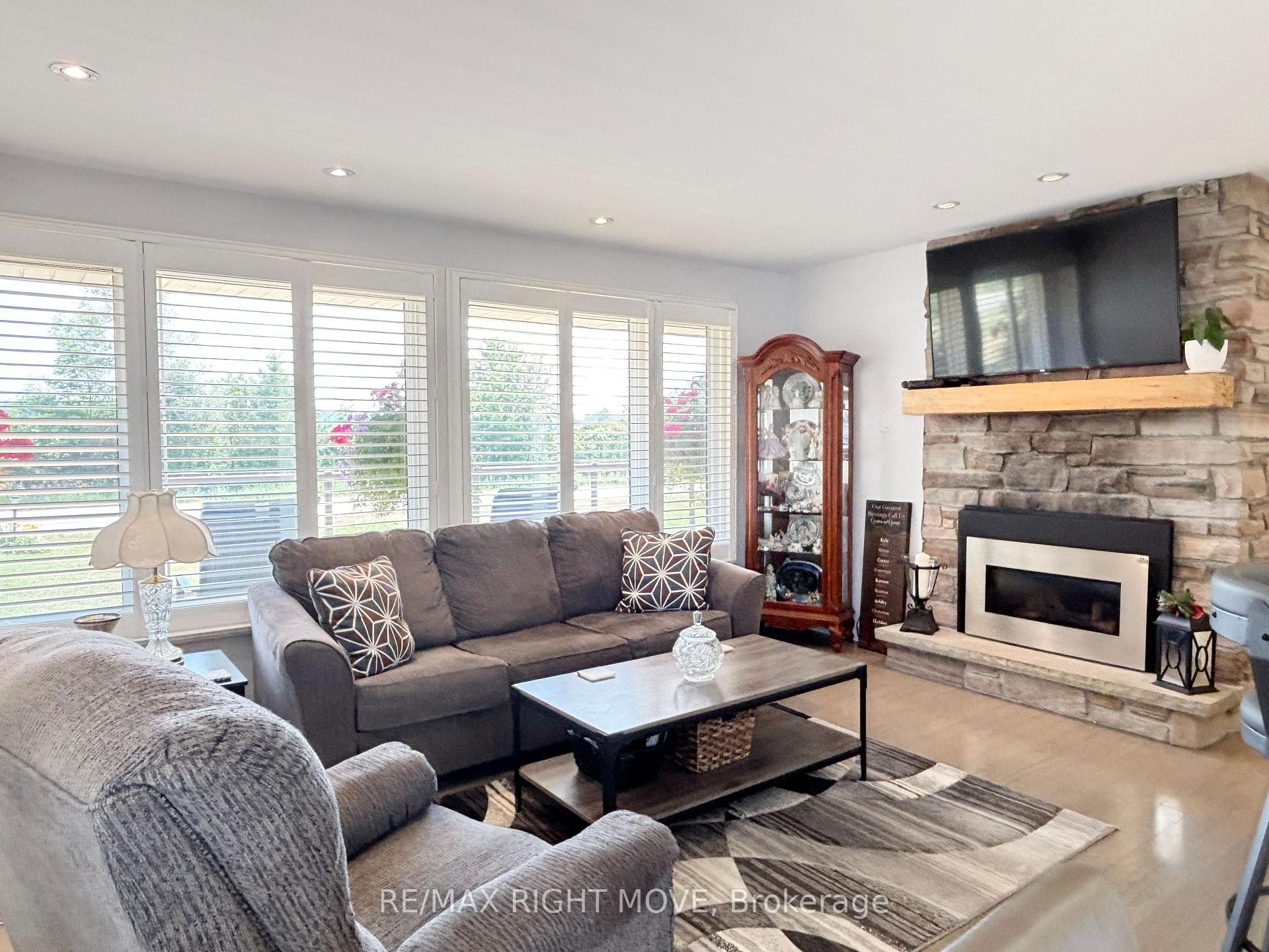 Living room with brick fireplace