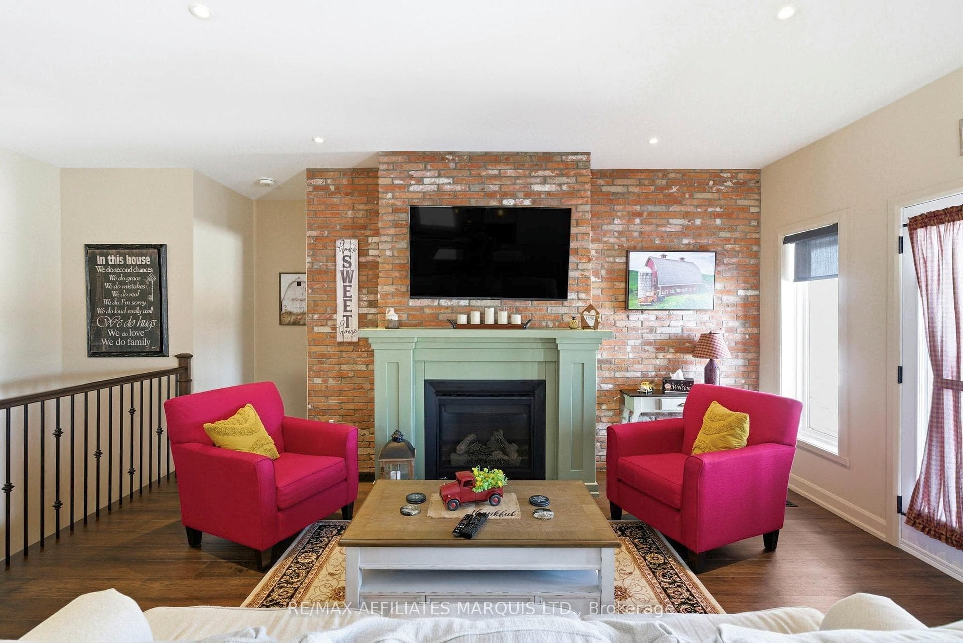Gorgeous brick accent wall with gas fireplace