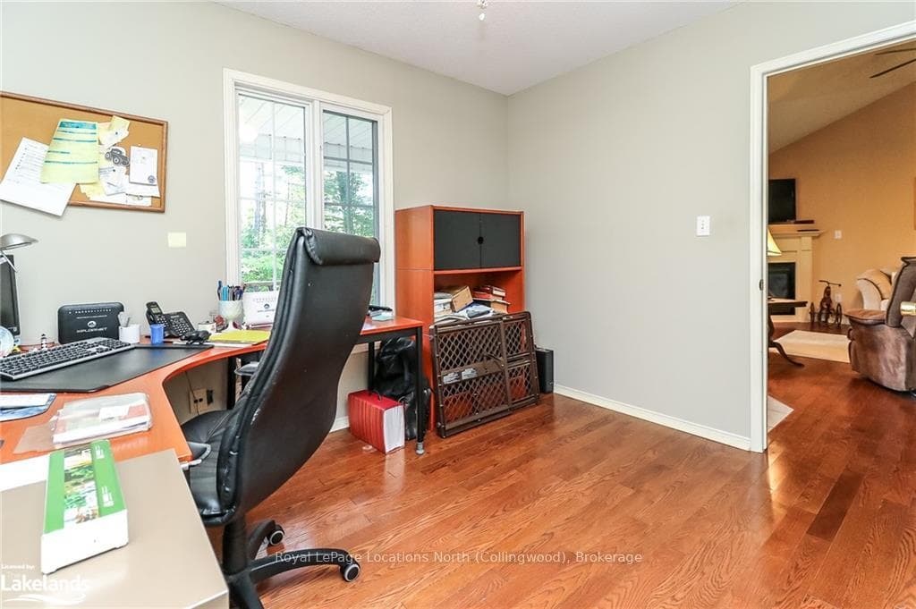 1 of 3 bedrooms currently being used as an office.
