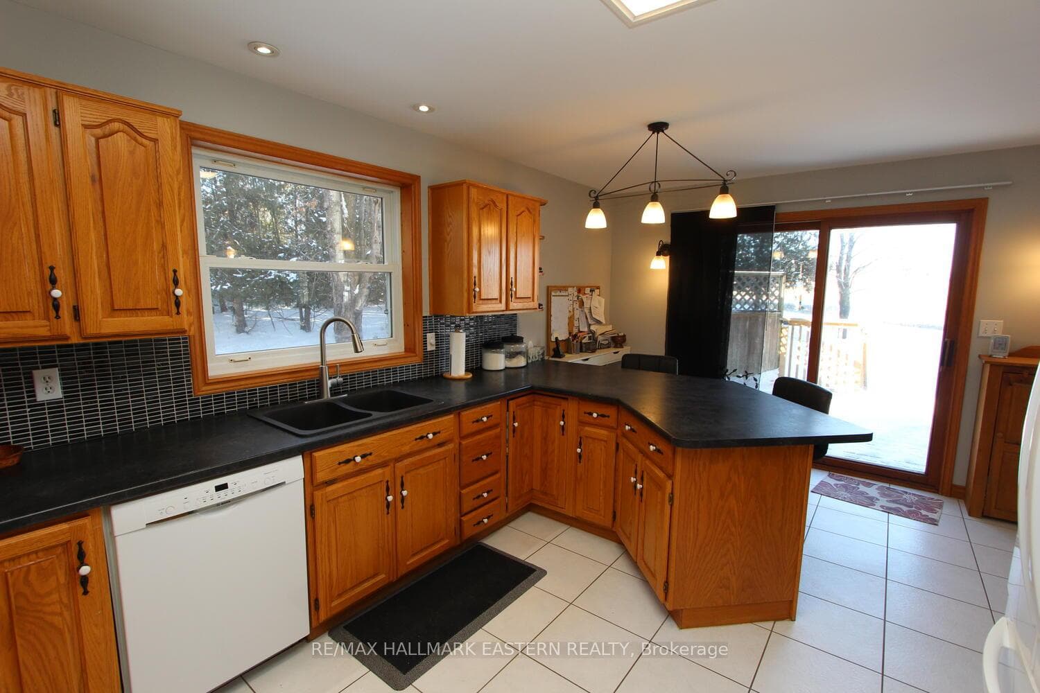Kitchen with walkout to deck