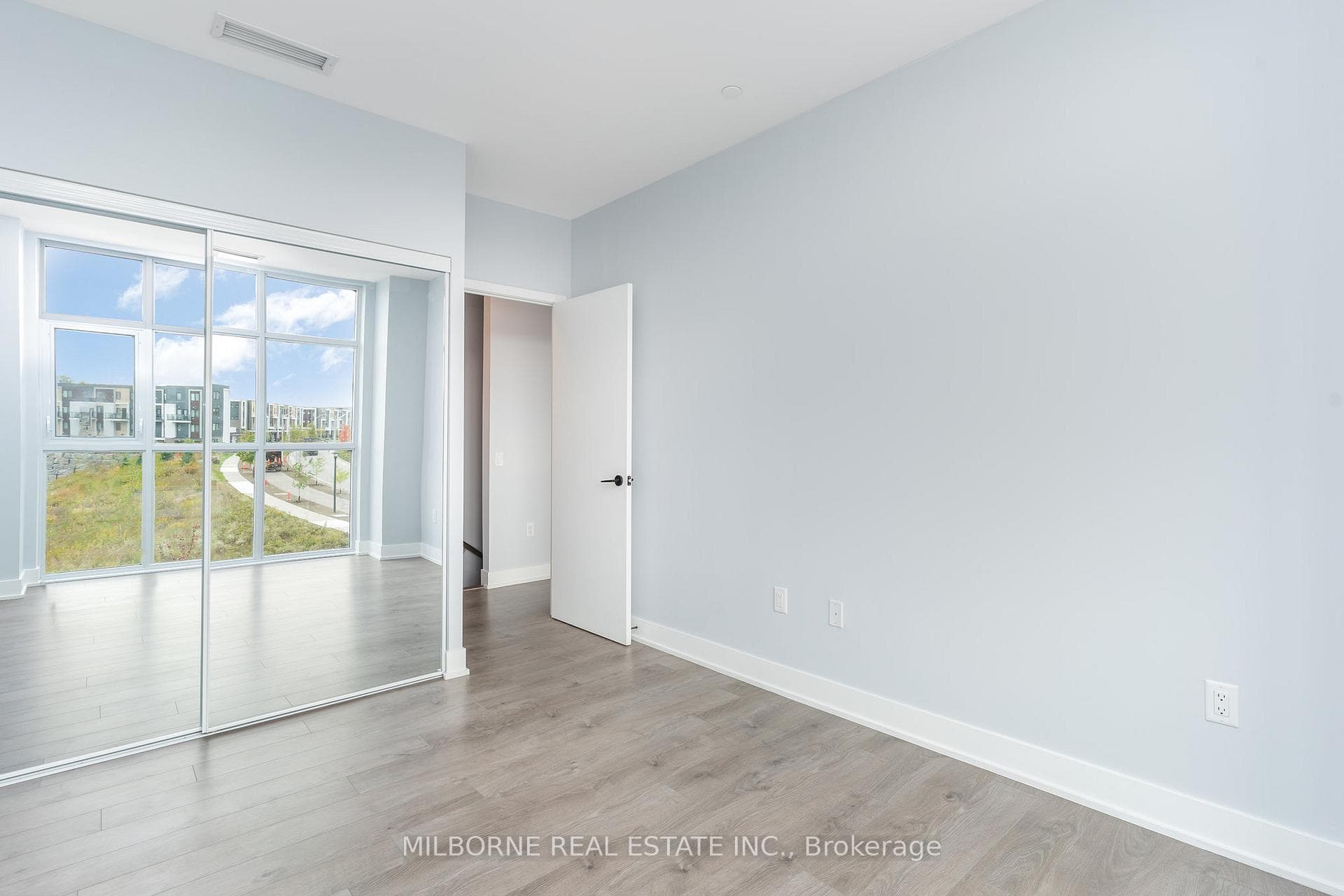 2nd Bedroom Features Mirrored Closet Doors