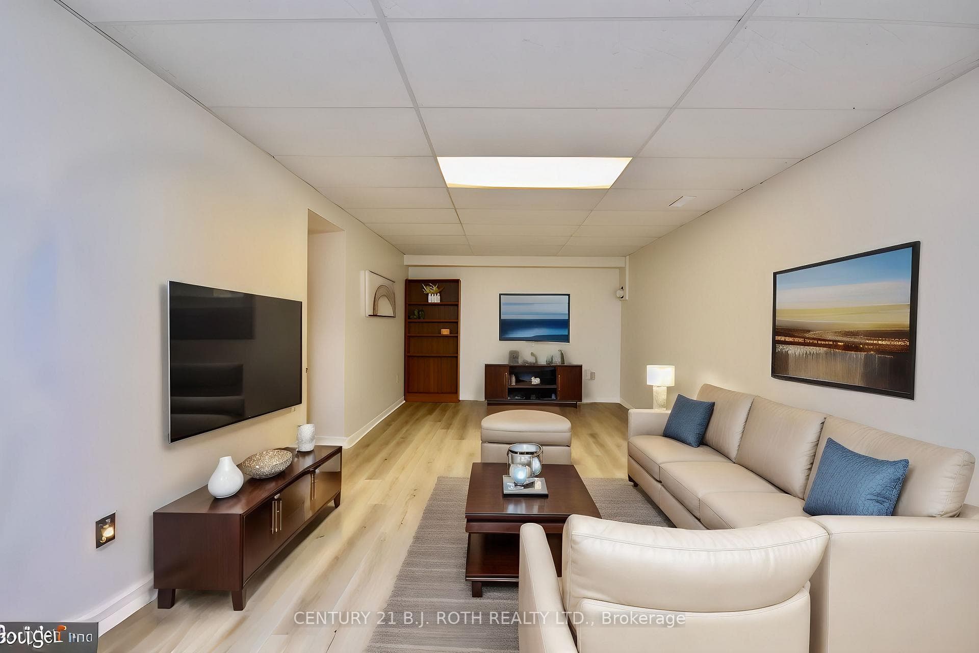 Virtually staged rec room in in-law suite.