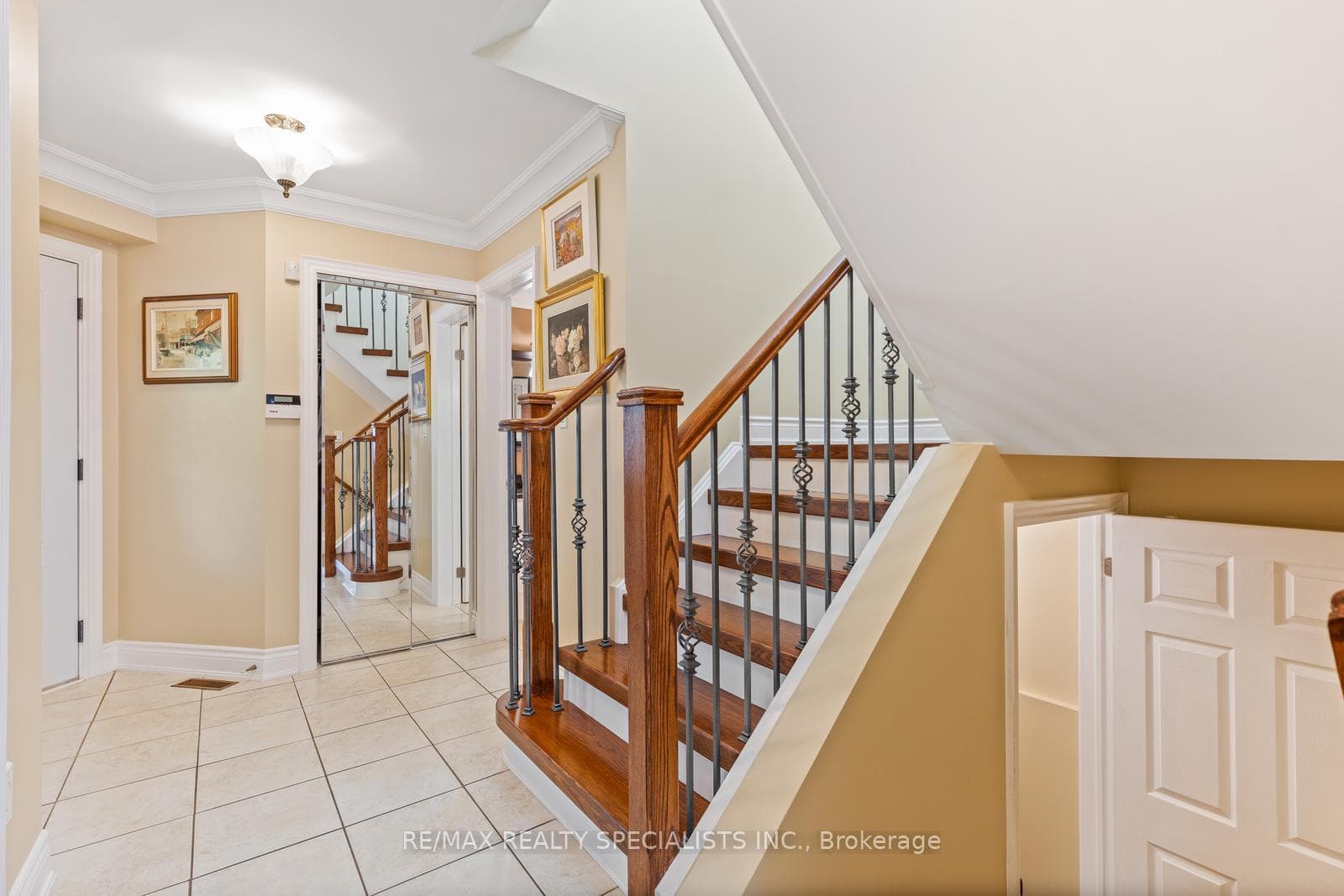 Upgraded Staircase Leading To Upper Level