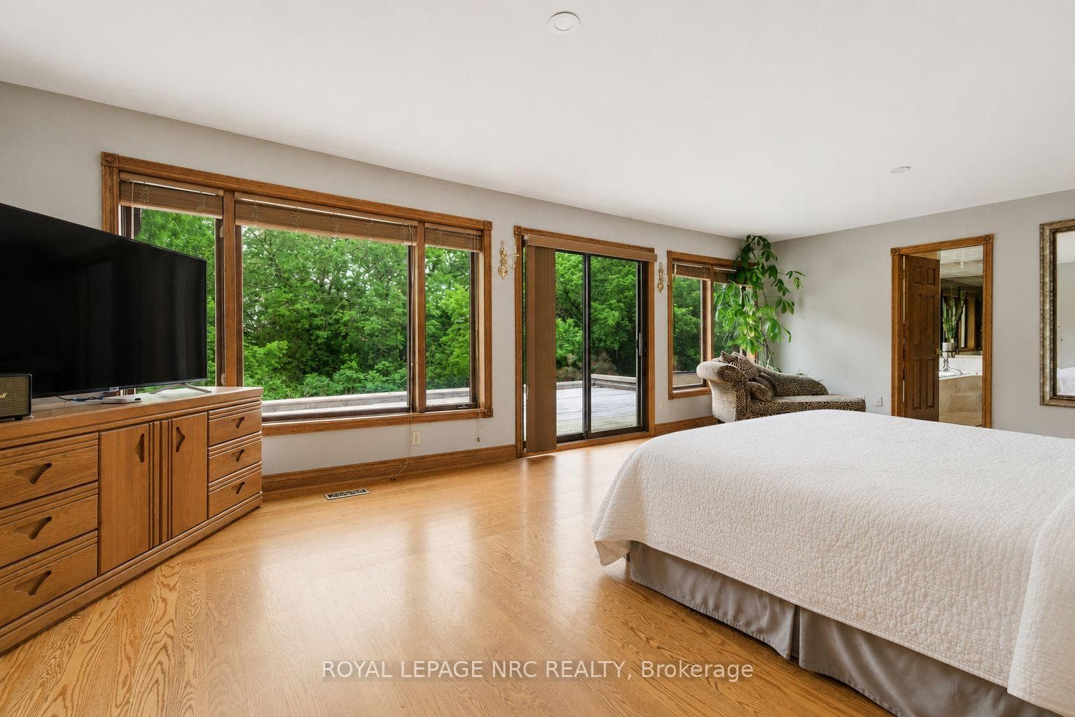 Panoramic views of lush greenery - primary suite