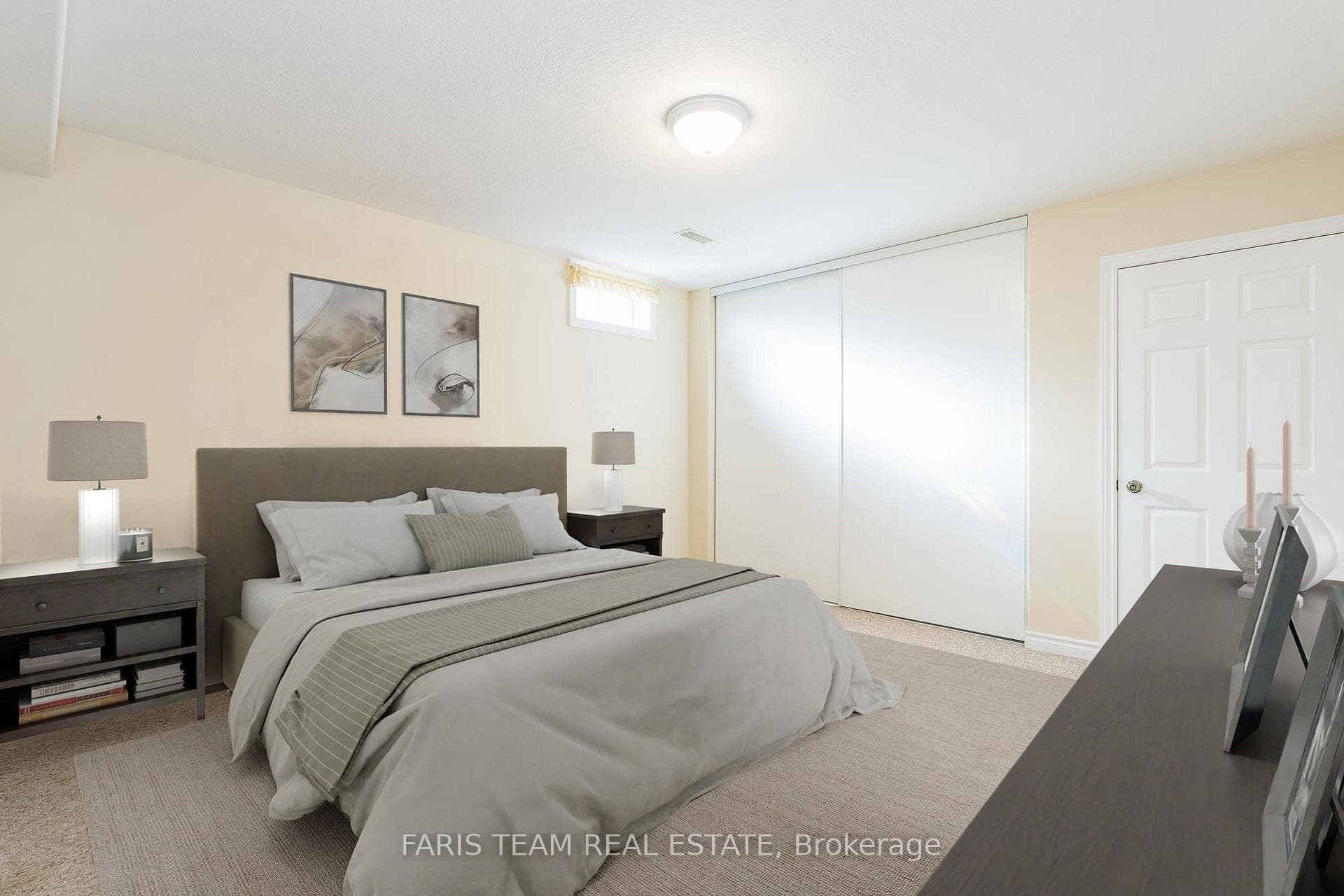 Bedroom with large closet and carpet flooring
