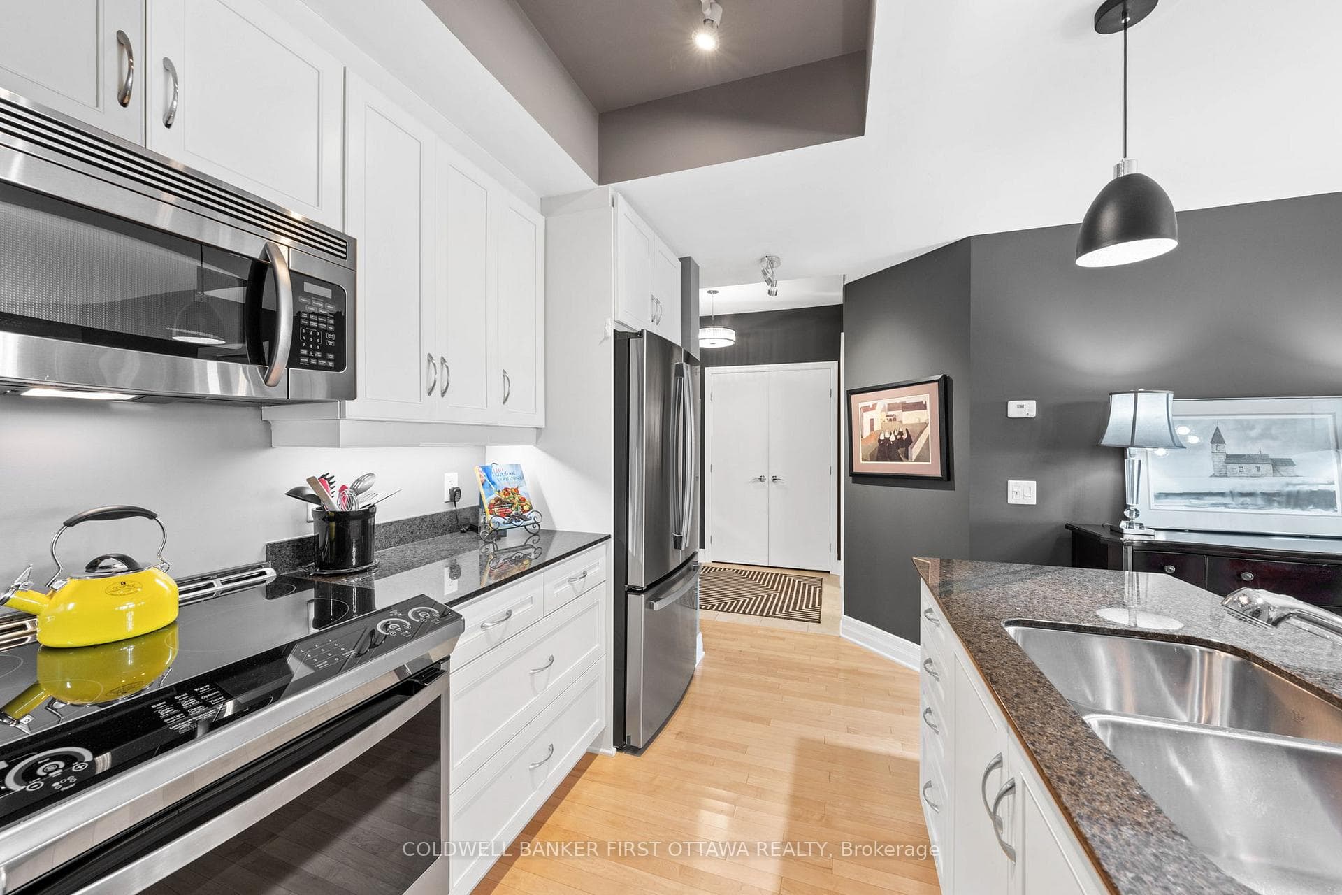 Deep dbl sink & ample storage space throughout.