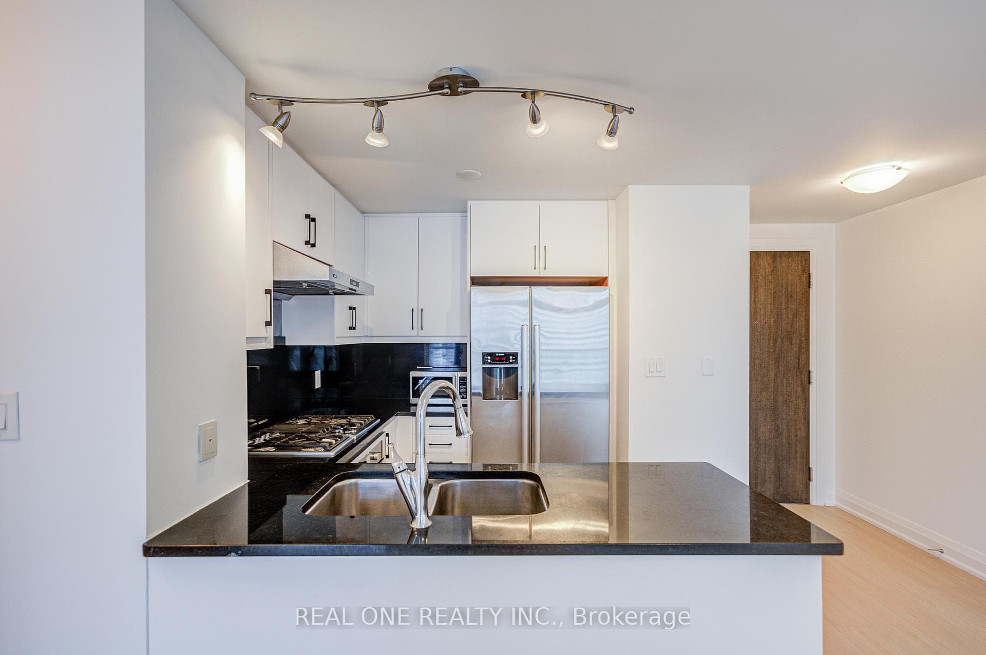 Newly Renovated Kitchen With Granite Countertop