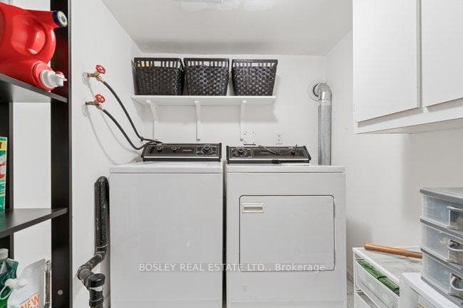 laundry room with top load appliances