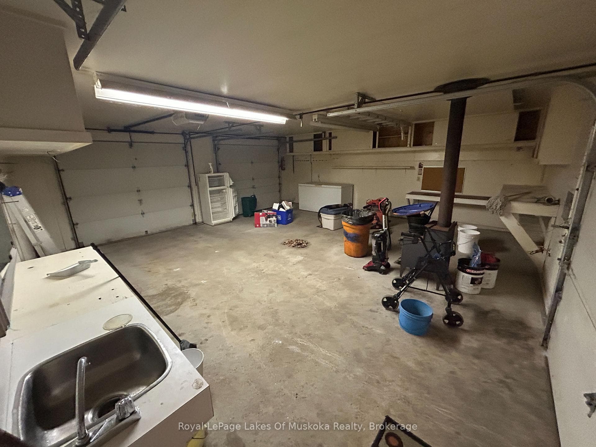 oversized insulated garage with wood stove & water