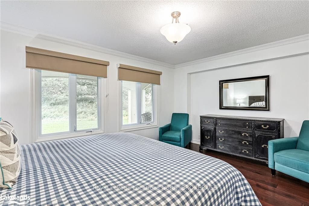 Bedroom featuring dark hardwood / wood-style floor