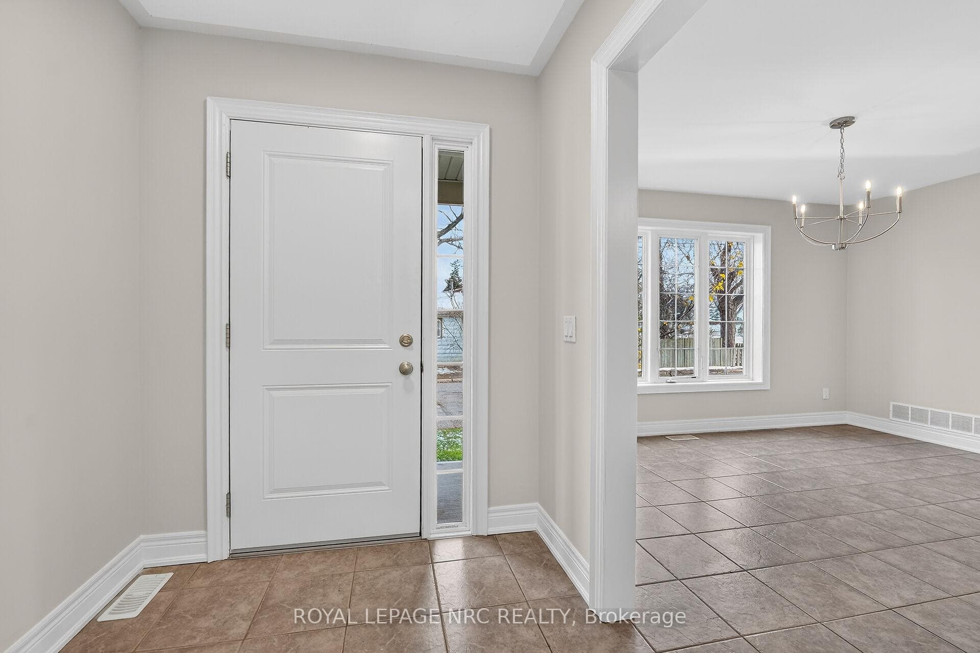 BACK/SIDE ENTRANCE INTO MUD ROOM WITH COAT CLOSET