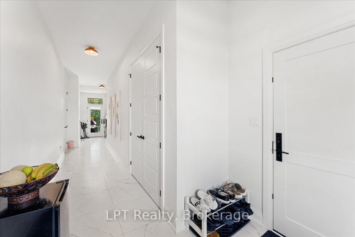 mud room with 3 door access