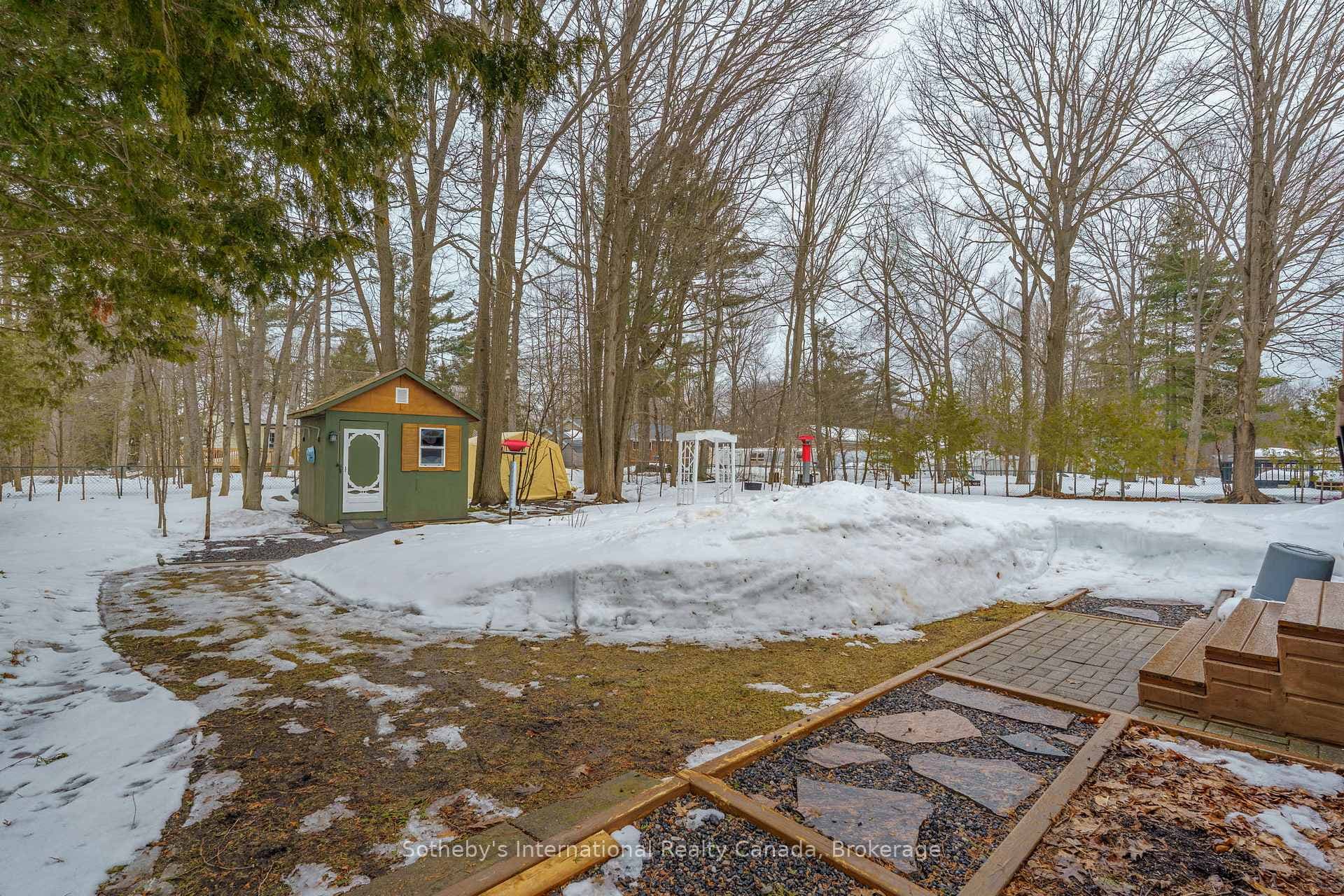 Level fenced in rear yard.