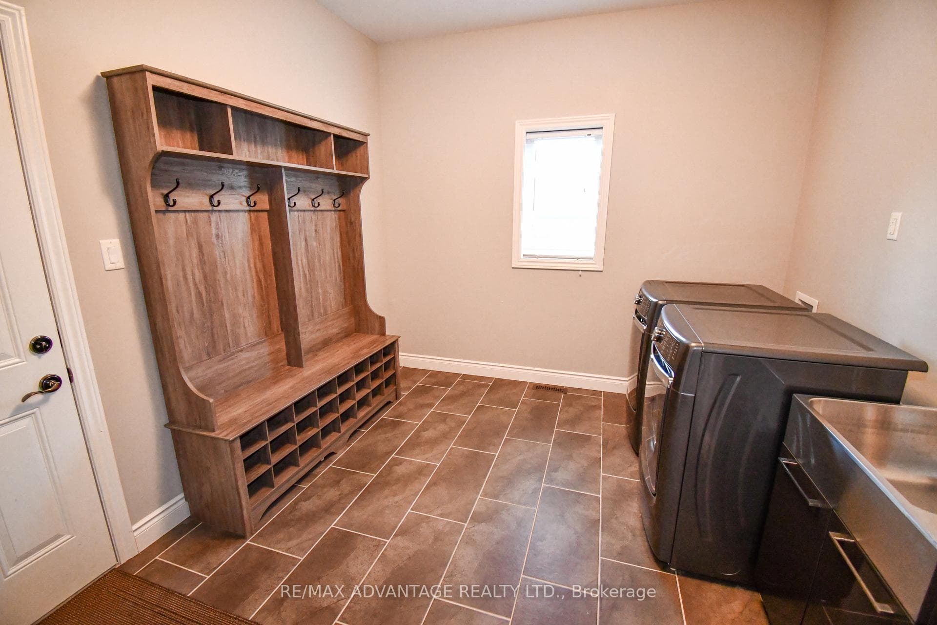 Main floor laundry with sink