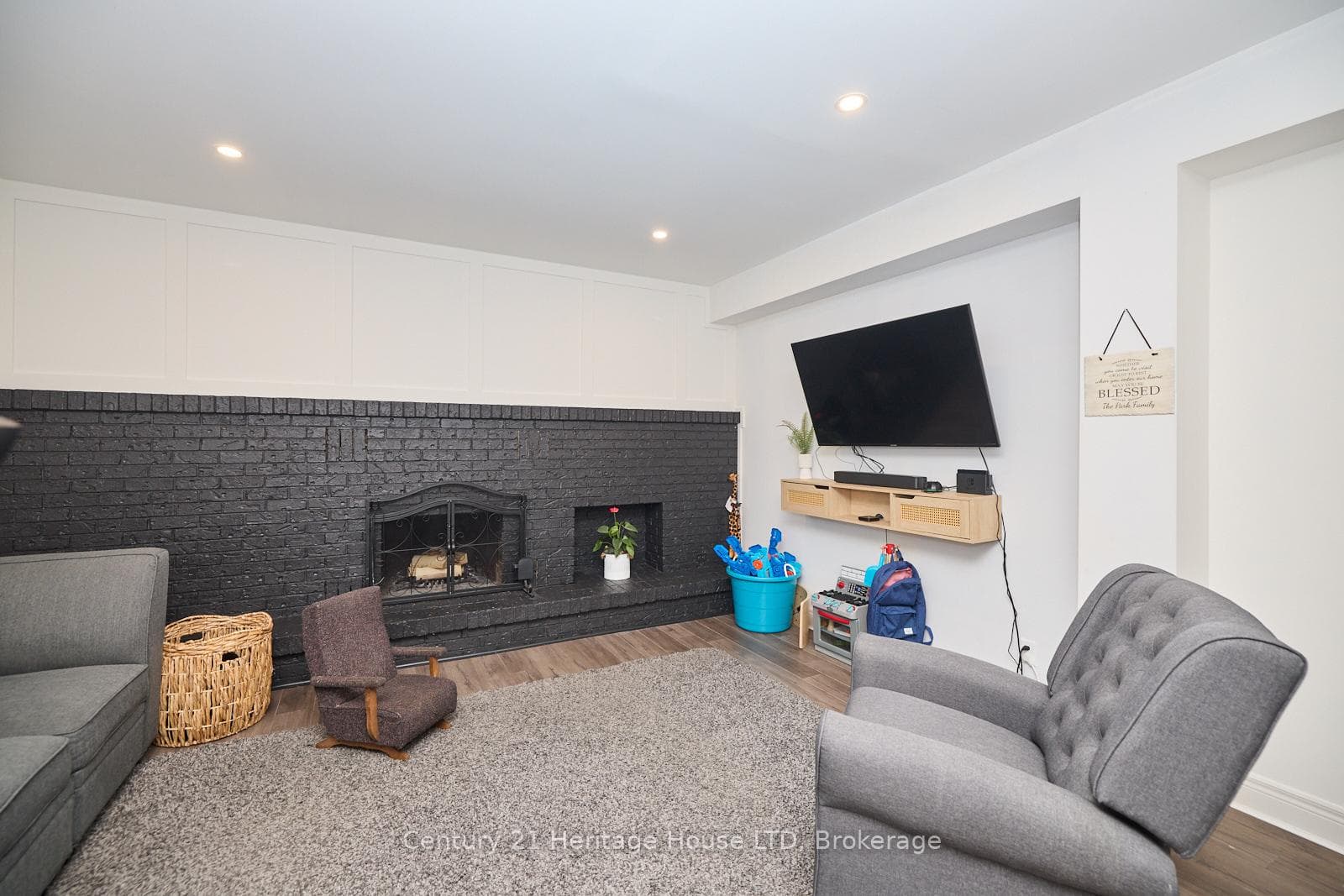 Rec room in the lower level with fire place