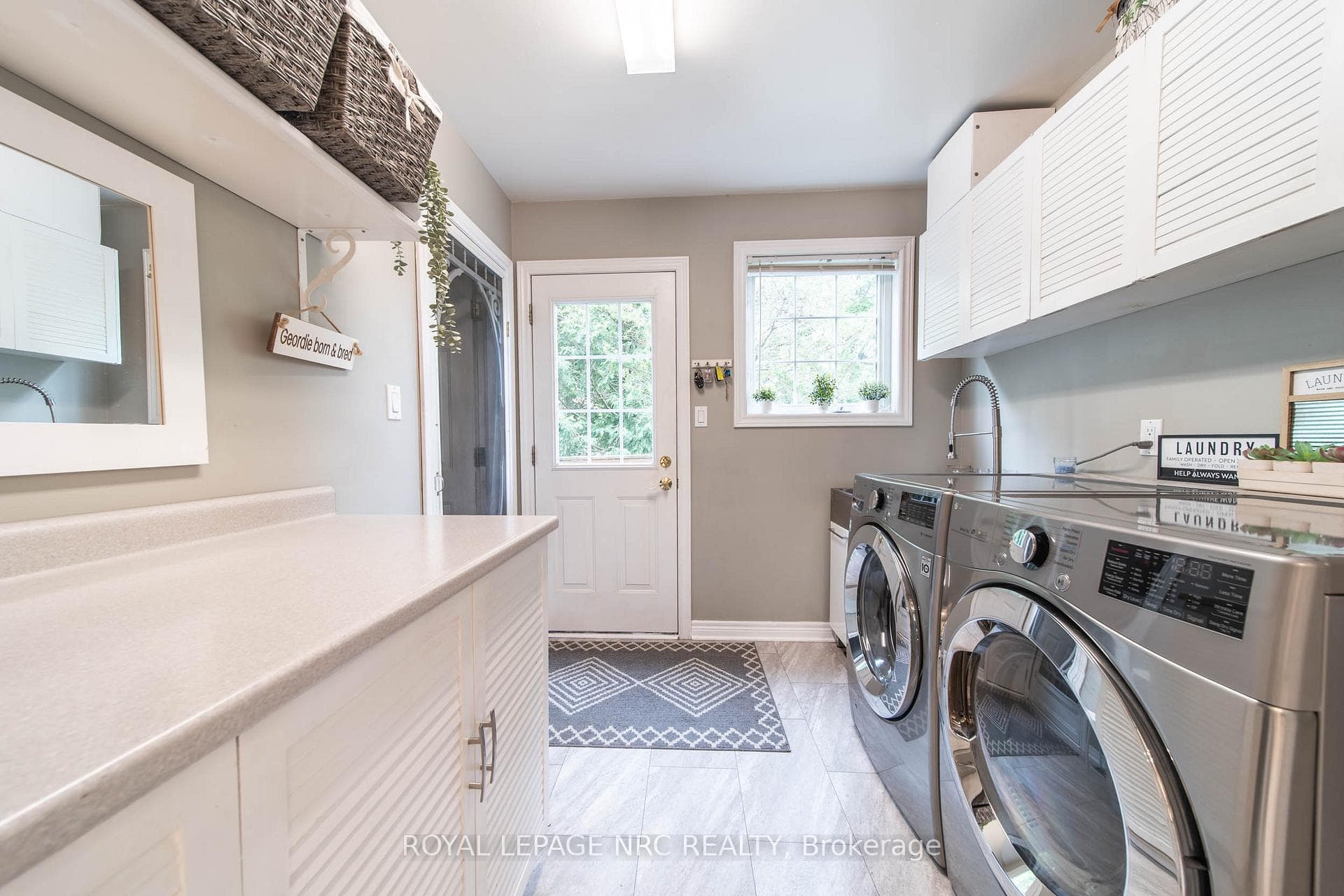Main floor laundry with access to garage ands yard