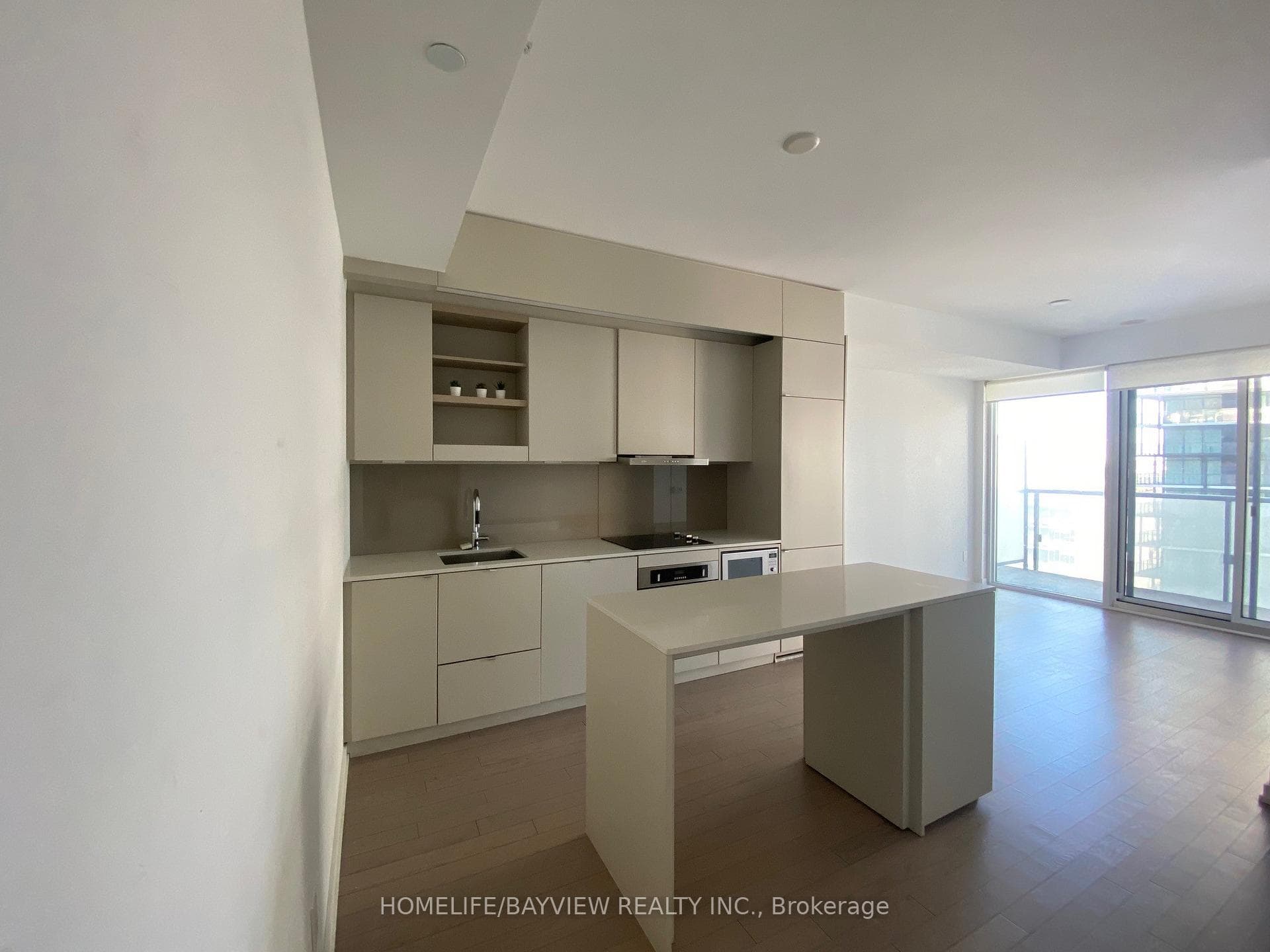 Open concept kitchen-dining- living space