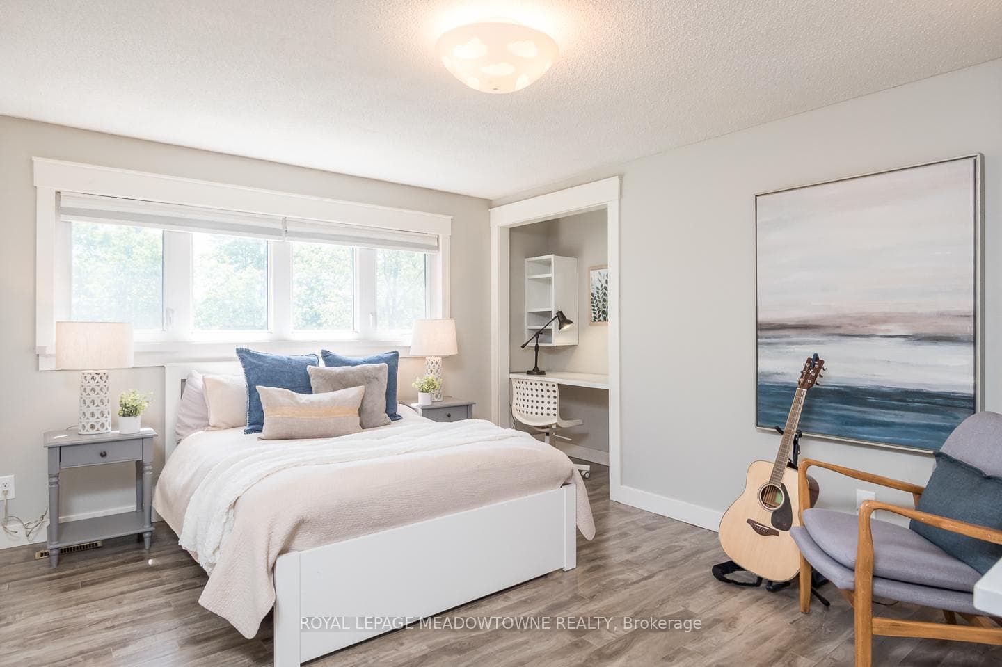 Another large bedroom with built in desk