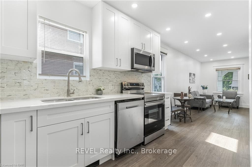 Custom designed kitchen with ceiling height cabine