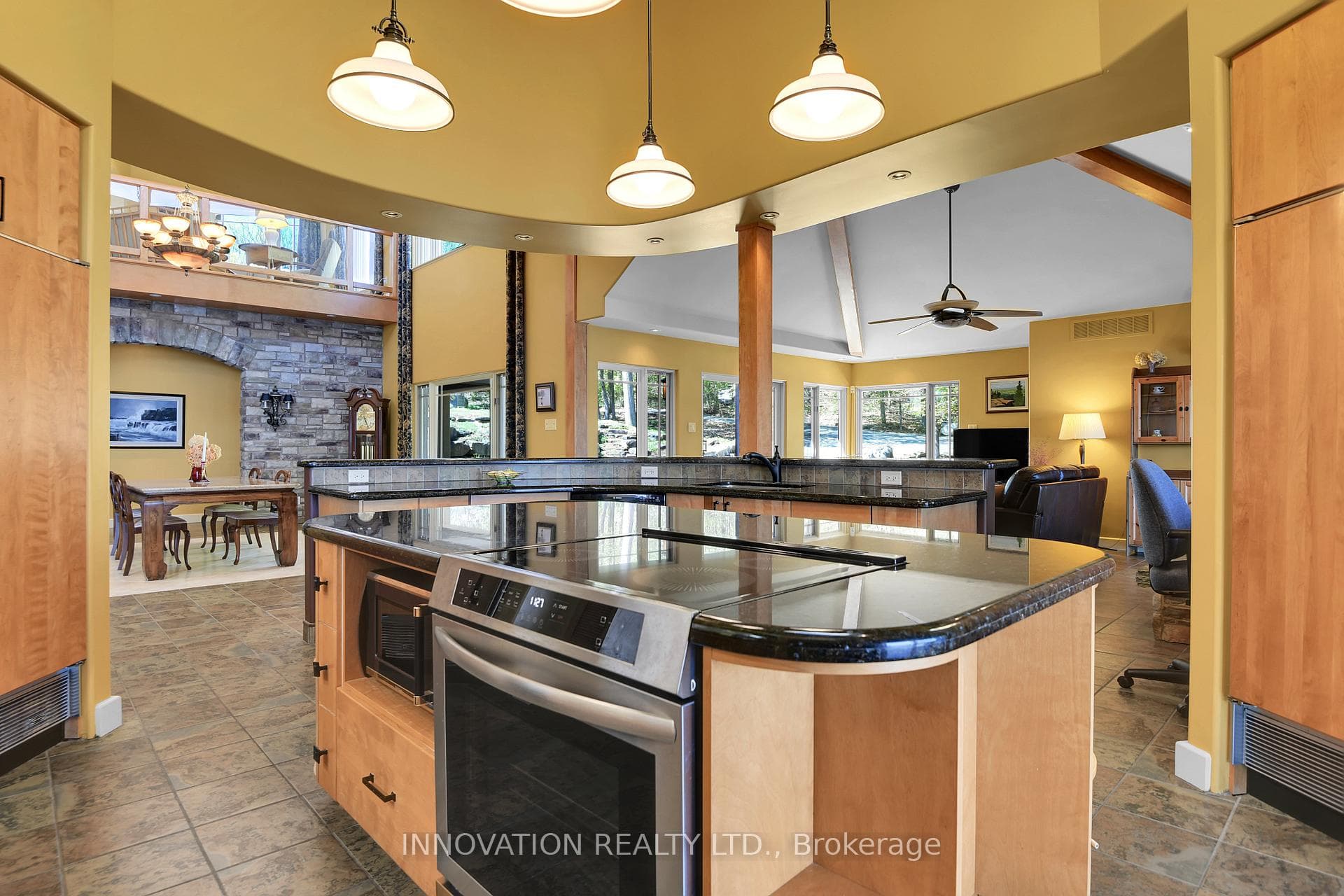 Kitchen open to both Dining & Family Rooms