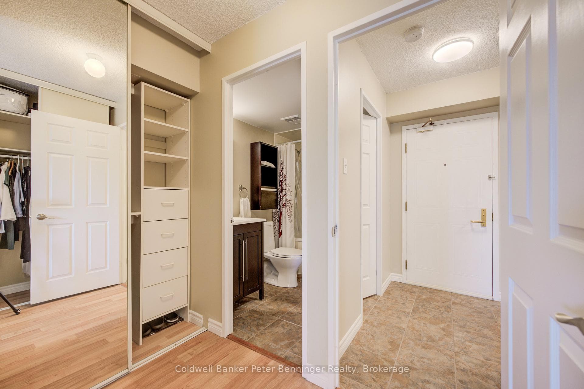 view from bedroom to cheater ensuite and entrance