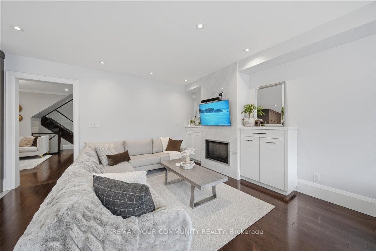 Large Family Room W/ Fireplace & B/I Cabinets