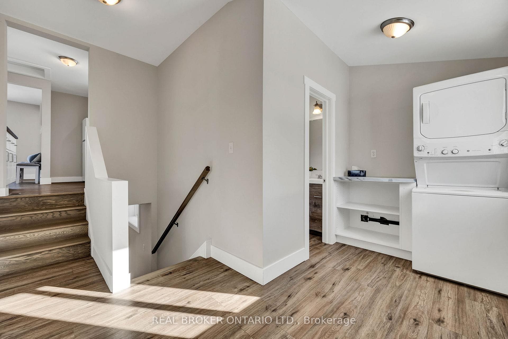 Laundry area with stacked washer / drying machine