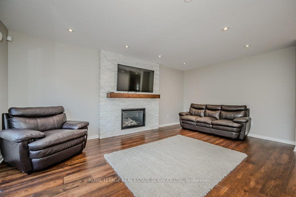 Family Room with Gas Fireplace & Walk-Out to Yard