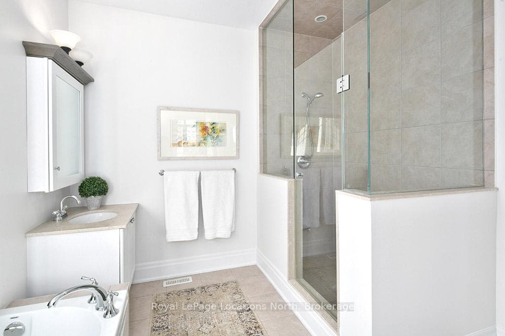 Primary Ensuite With Glass Shower & Tub