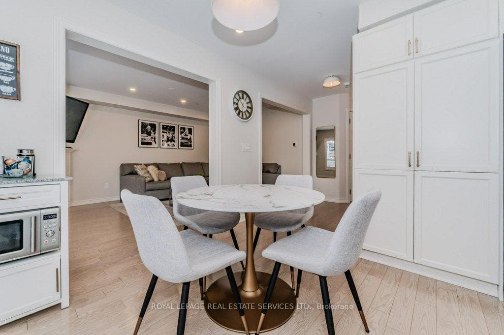 The Bright Breakfast Area is Open to Living Room