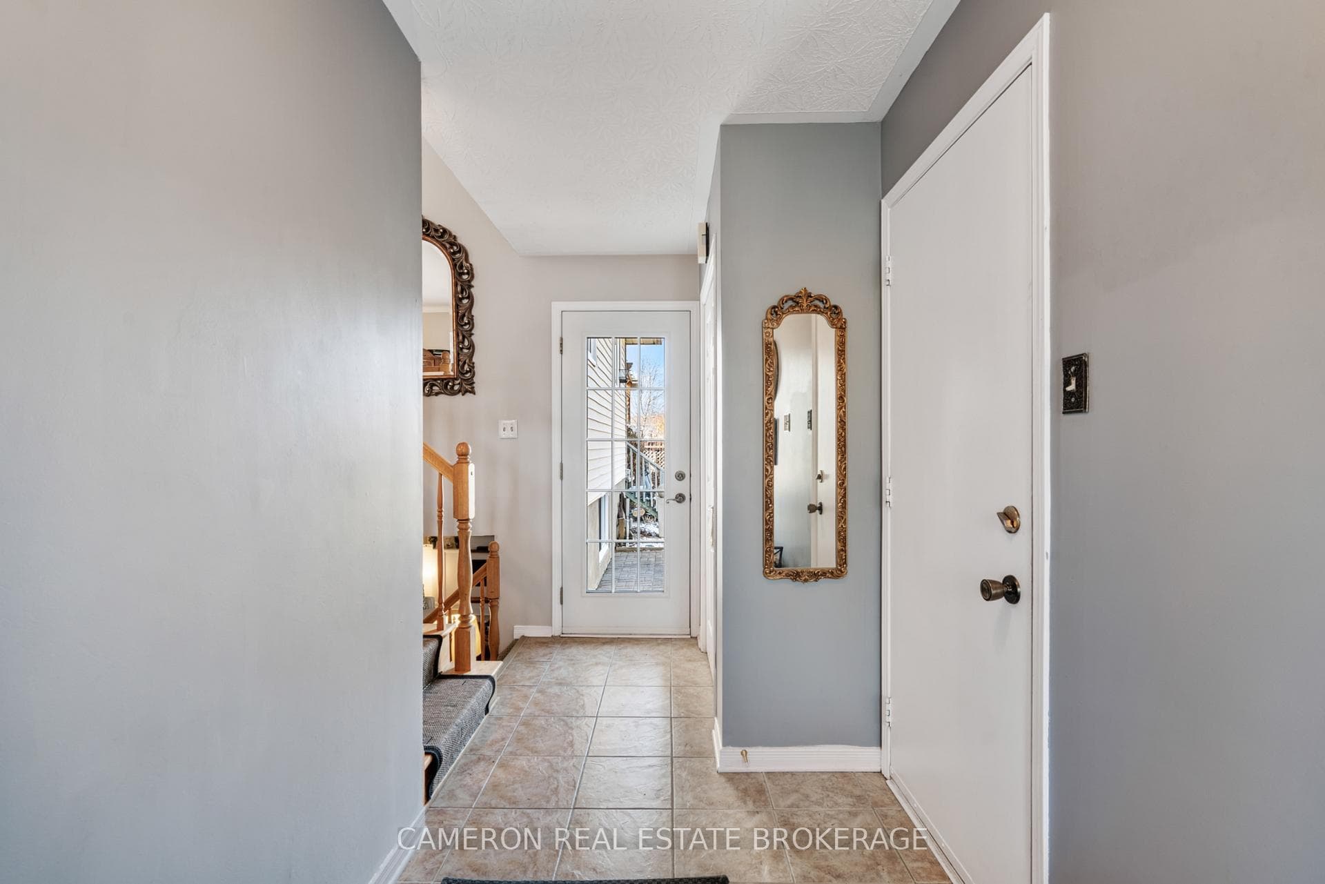 Spacious front foyer with access to the garage