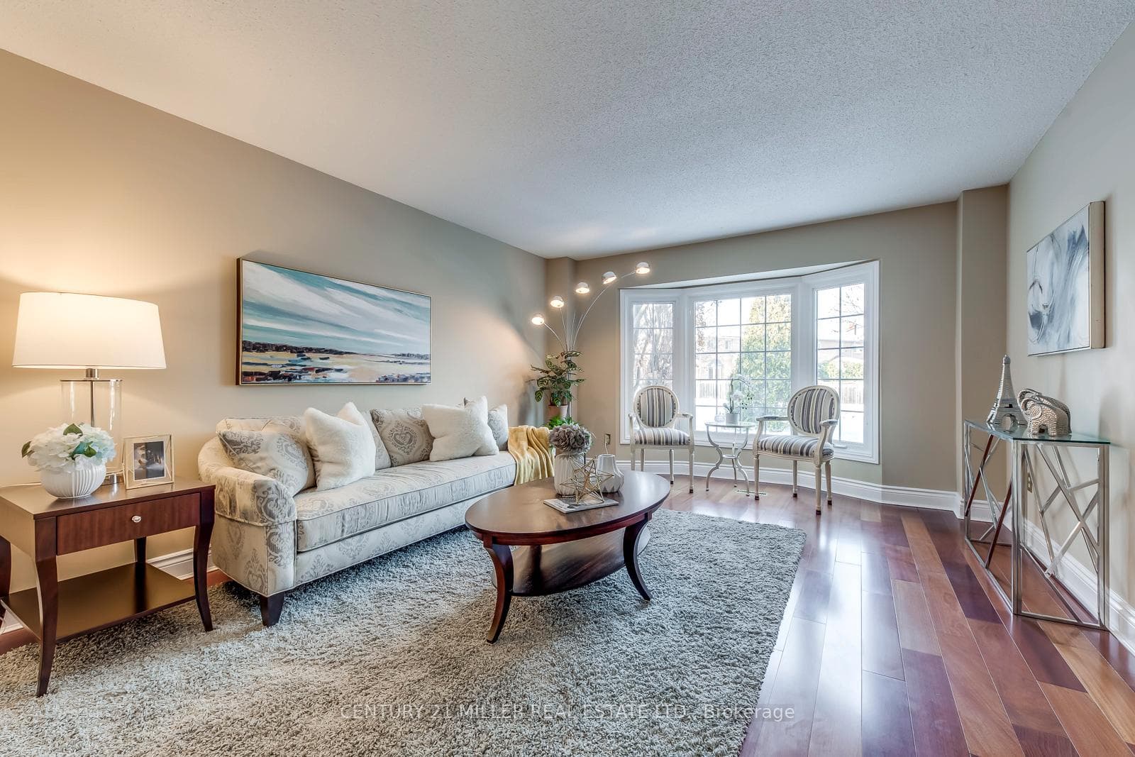 Living Room - Sunlit room with hardwood floors