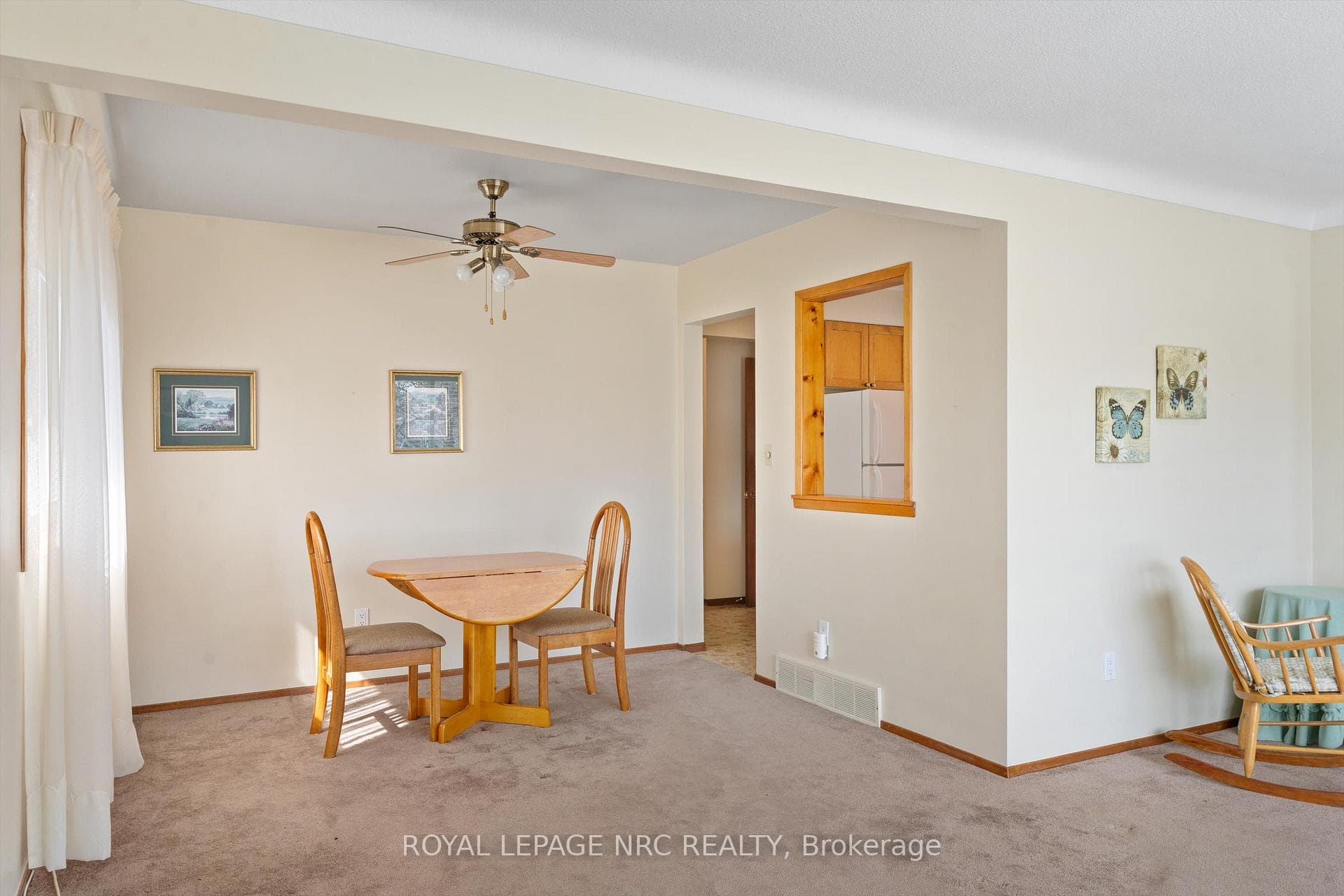 Dining room with pass thru window to the kitchen