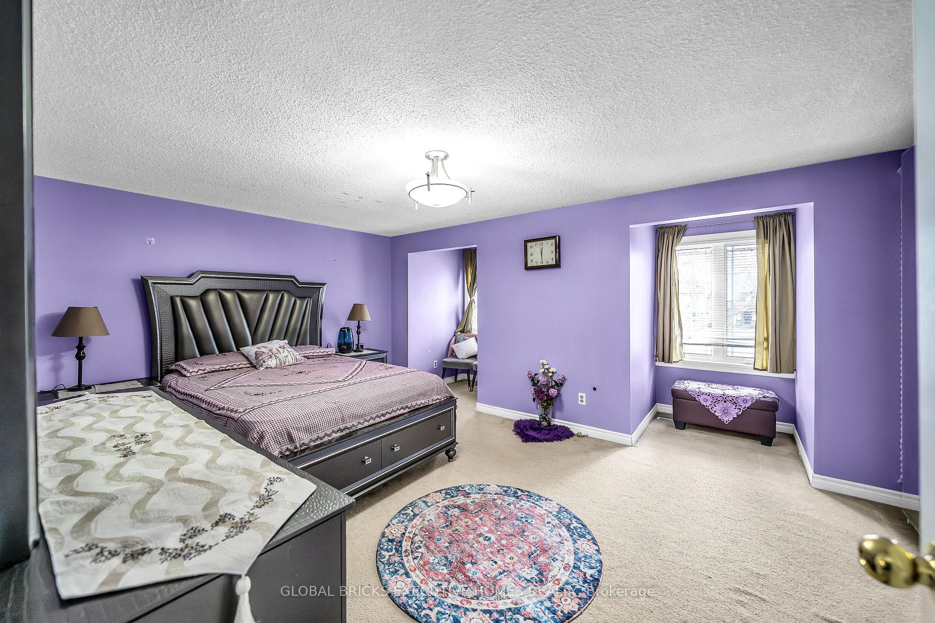 Bright Primary Bedroom Filled with Natural Light
