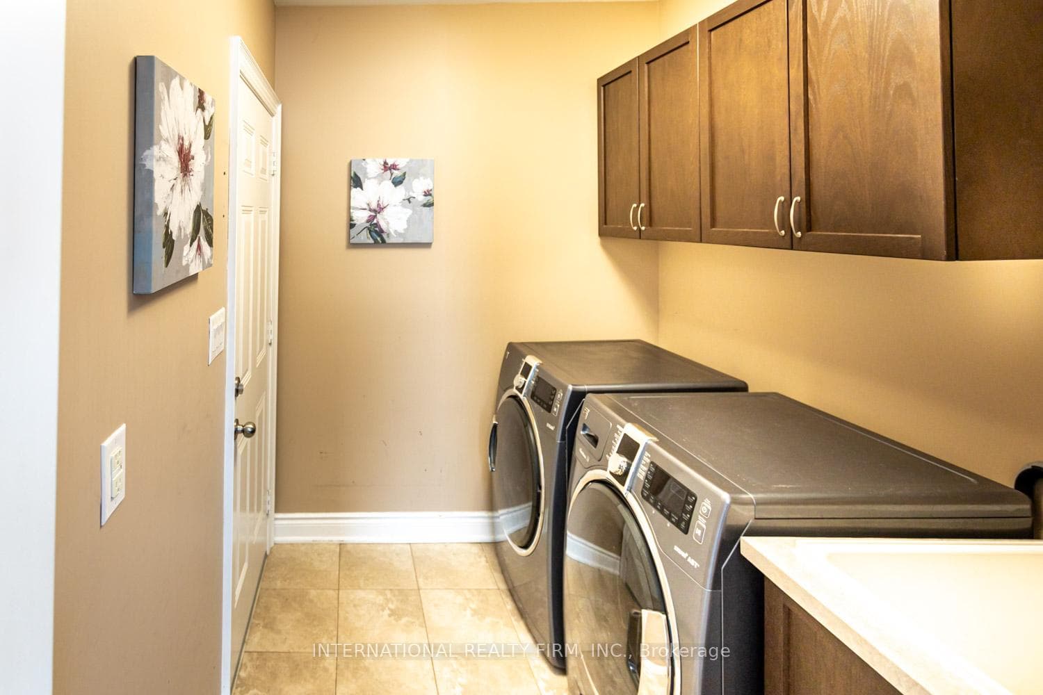 MAIN FLOOR LAUNDRY ROOM LEADS TO GARAGE