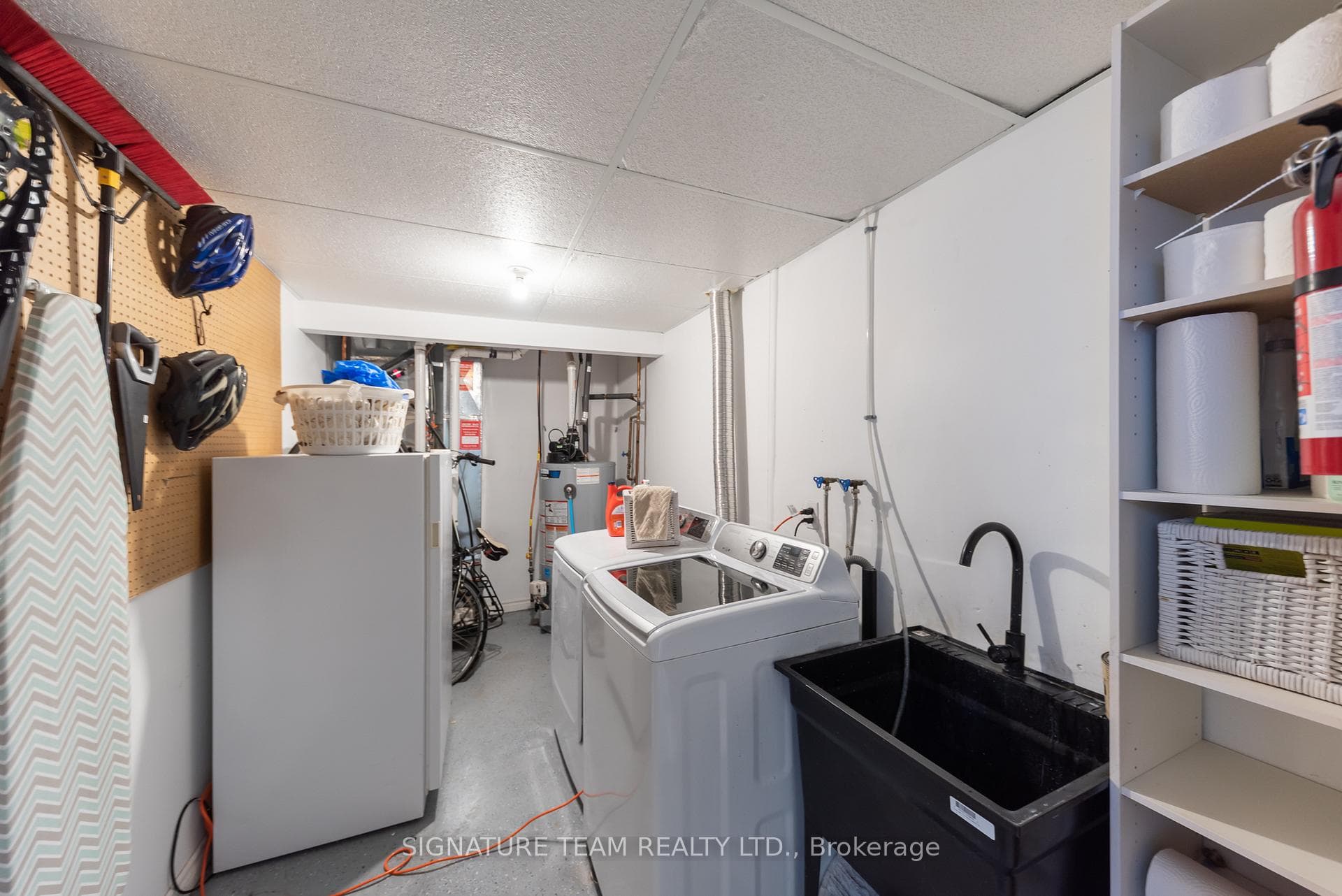 The utility room houses the laundry & mechanicals.