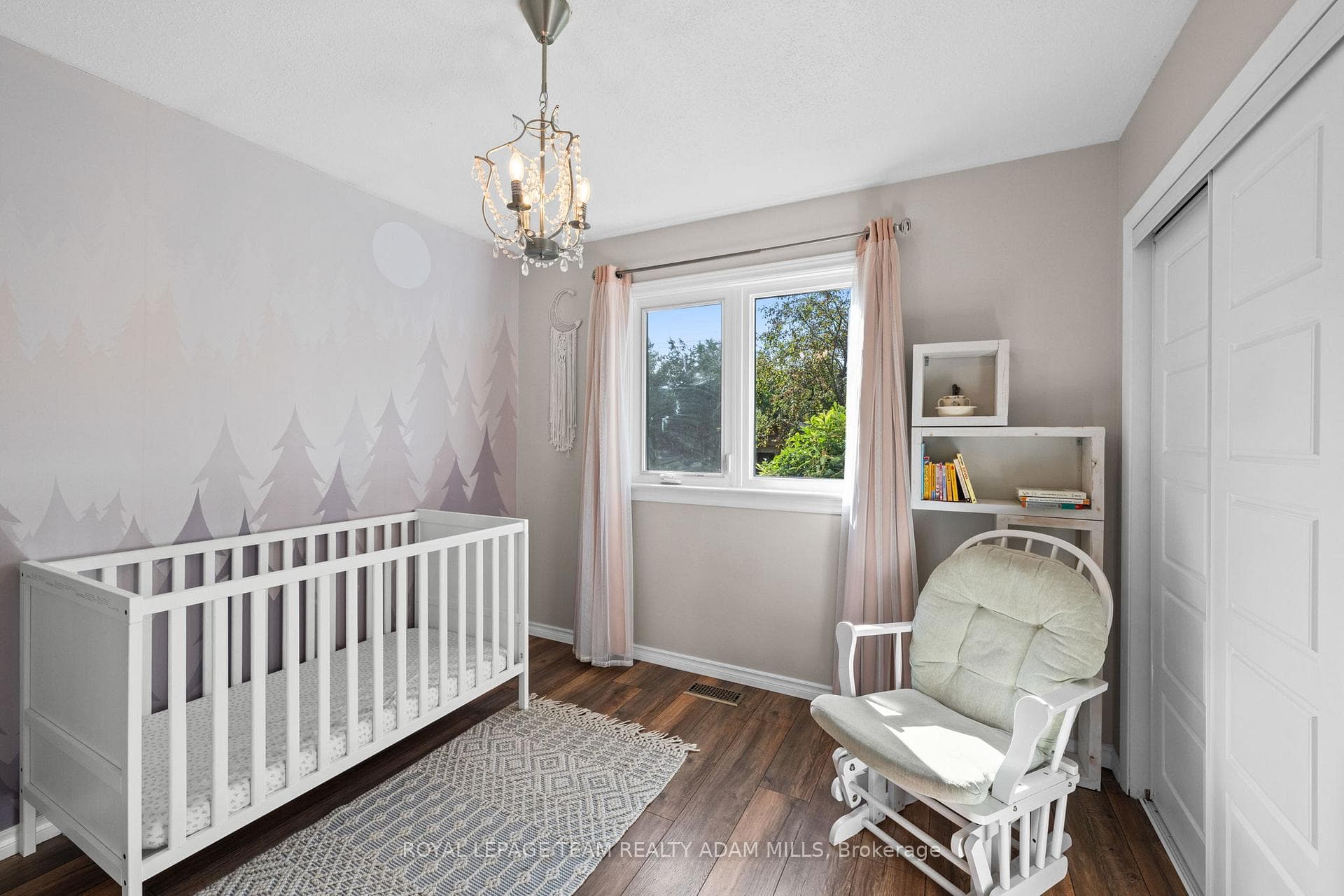 Natural light and backyard views in bedroom #3