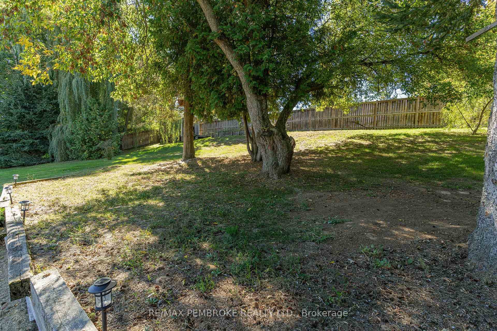 fully fenced private backyard