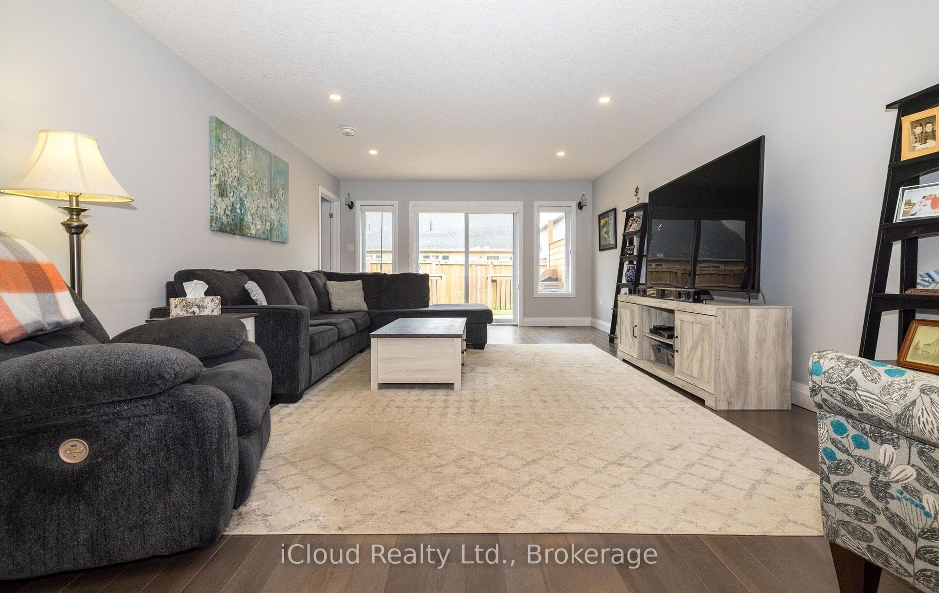 Living Room with Hardwood Floors & Pot lights