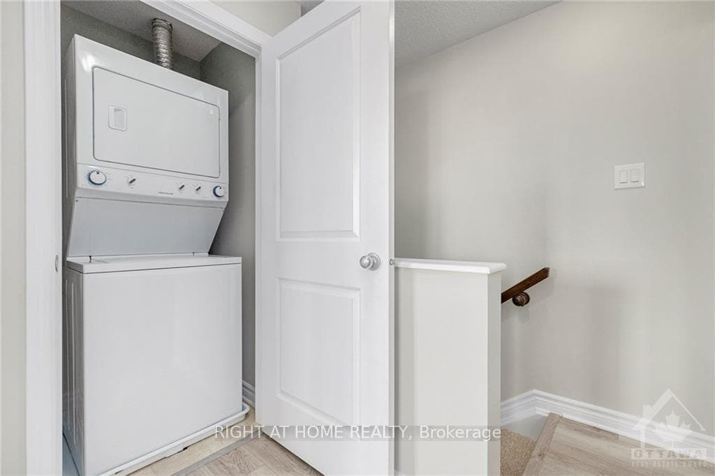Convenient in-unit laundry at the upper level