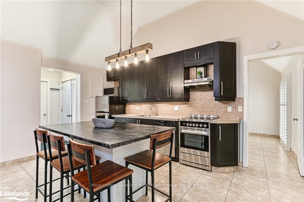 Kitchen featuring stainless steel appliances, a ki